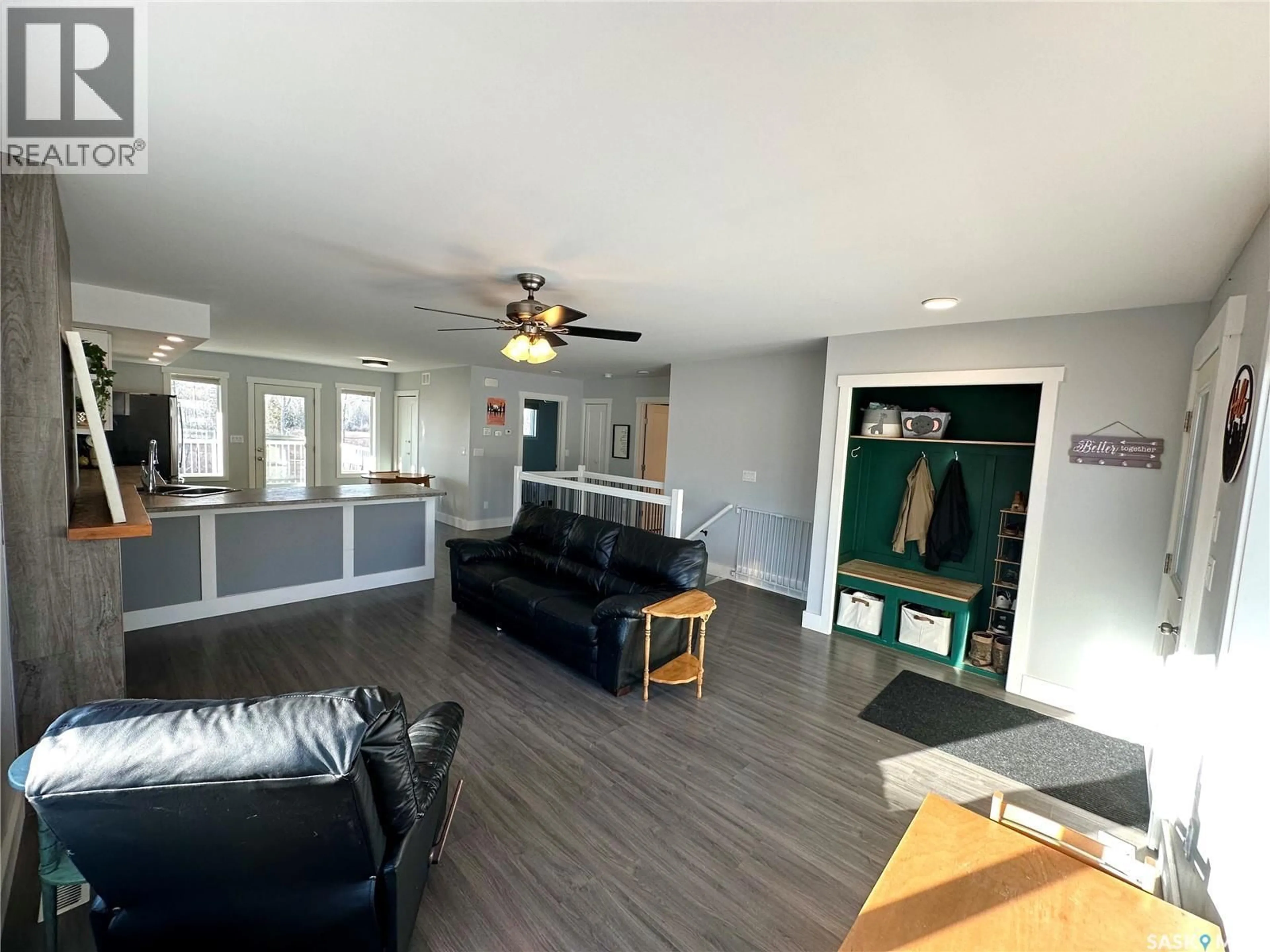 Living room with furniture, wood/laminate floor for 8 MORROW PLACE, Shell Lake Saskatchewan S0J2G0
