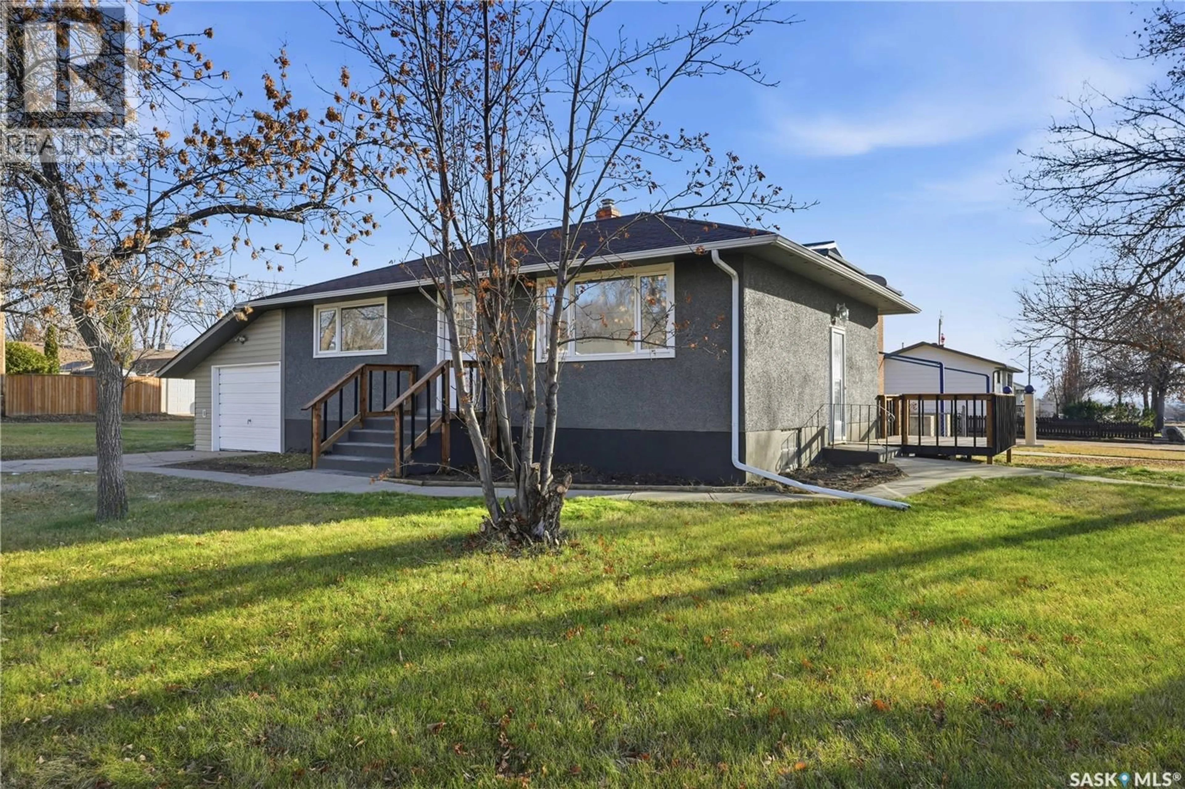 Home with vinyl exterior material, street for 1492 92ND STREET, North Battleford Saskatchewan S9A0A8