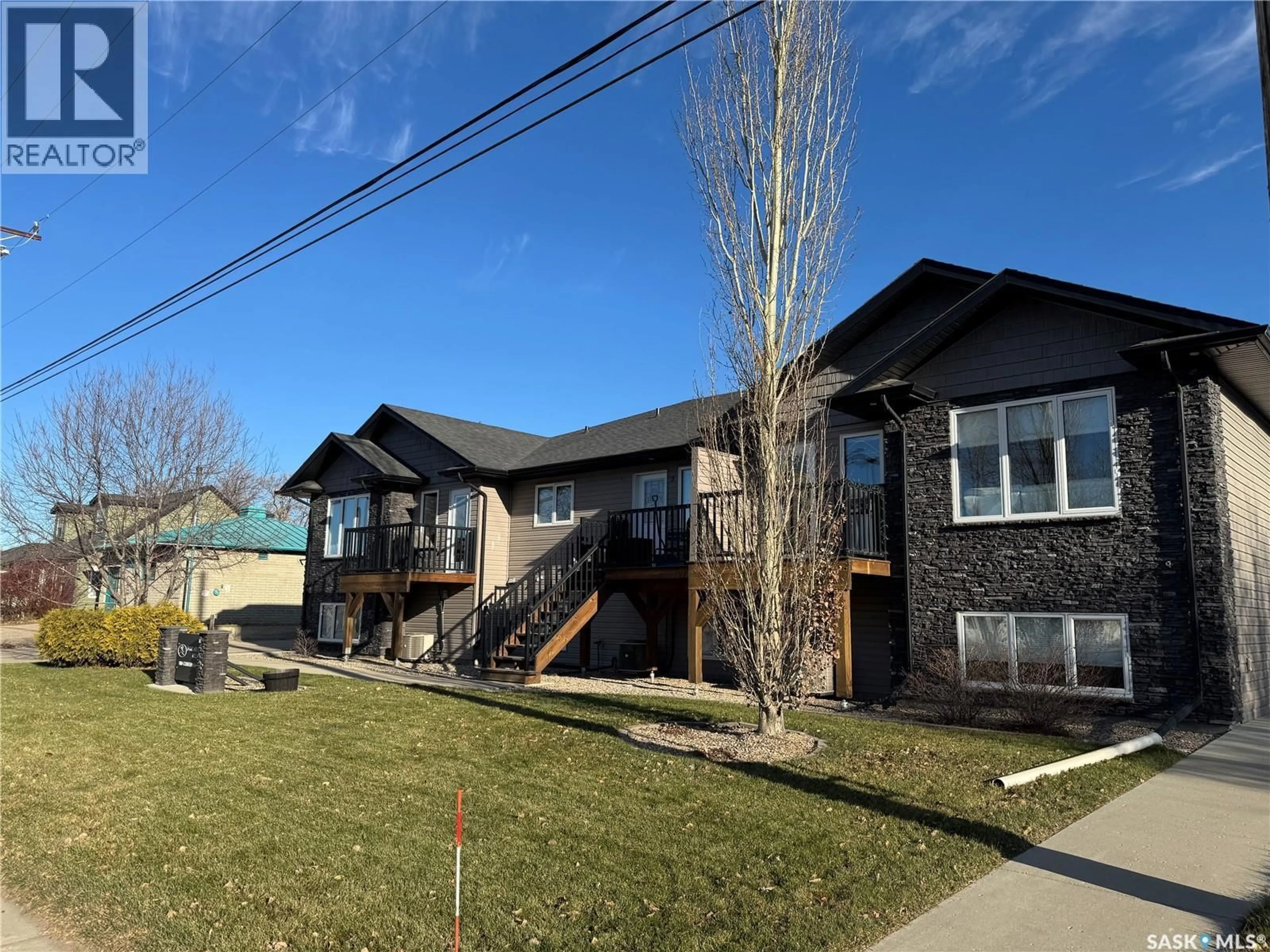 A pic from outside/outdoor area/front of a property/back of a property/a pic from drone, street for 110 - 4 CENTENNIAL BOULEVARD, Warman Saskatchewan S0K4S0