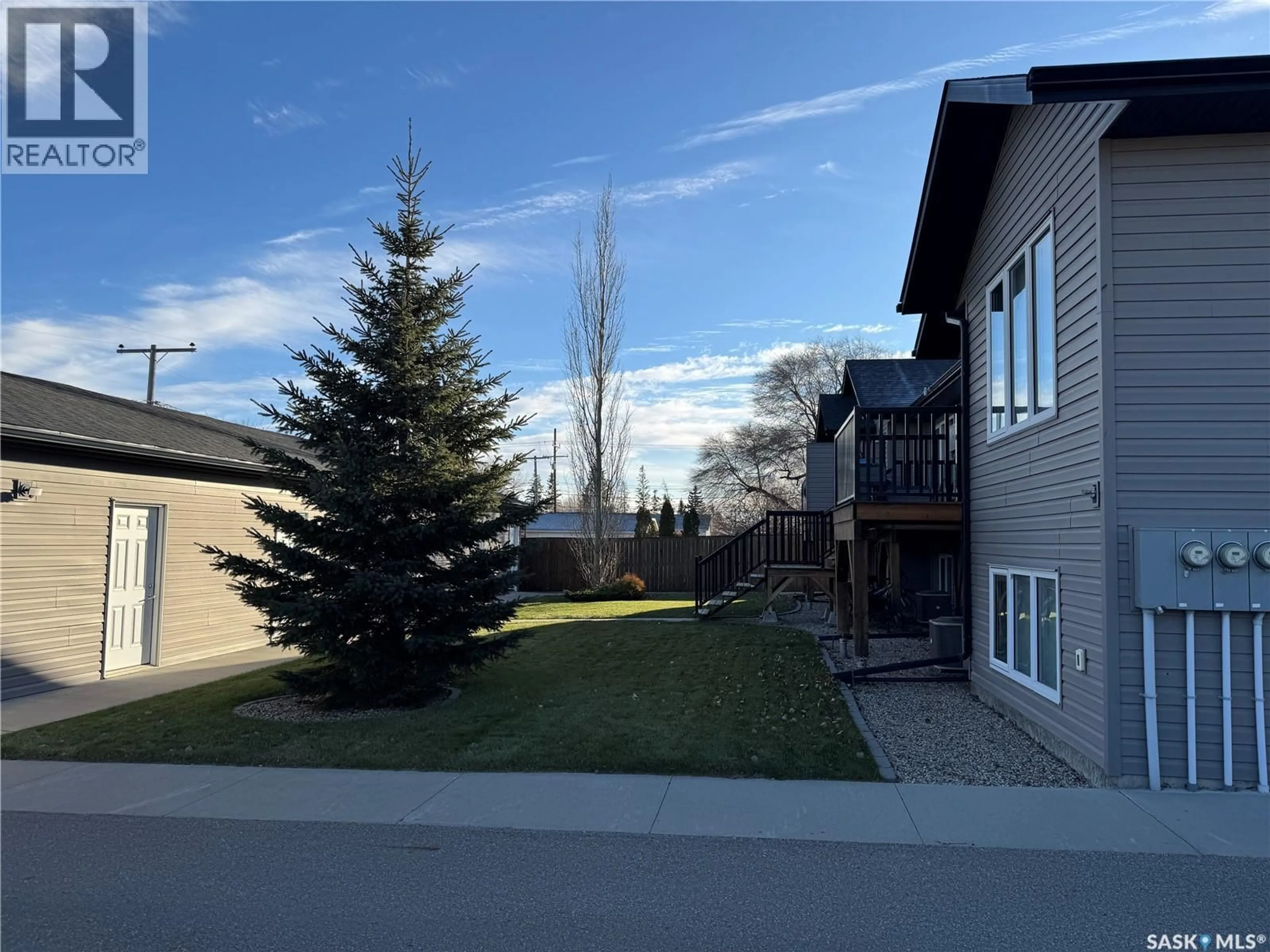A pic from outside/outdoor area/front of a property/back of a property/a pic from drone, unknown for 110 - 4 CENTENNIAL BOULEVARD, Warman Saskatchewan S0K4S0
