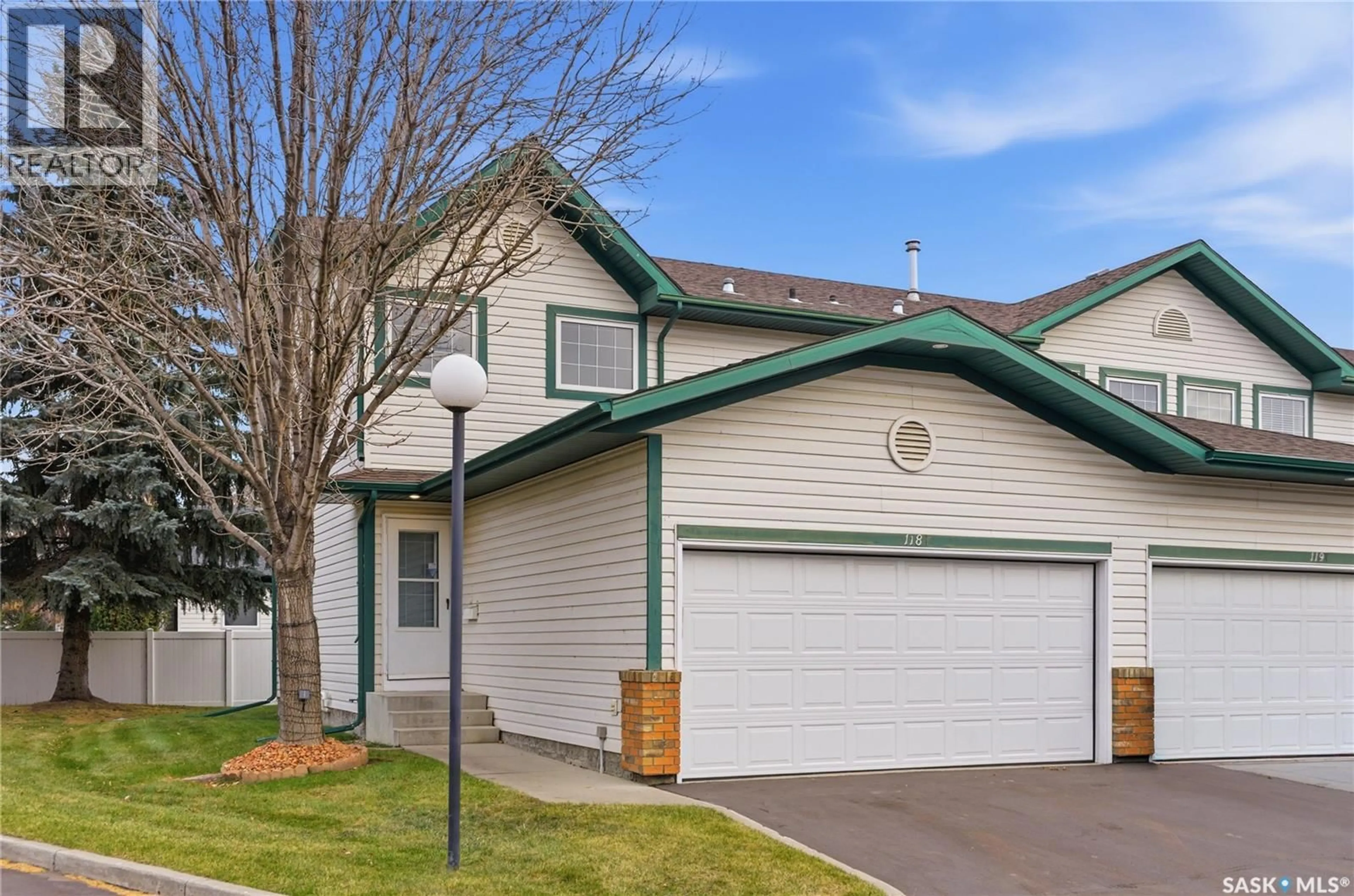 Home with vinyl exterior material, street for 515 - 118 MCWILLIE AVENUE, Saskatoon Saskatchewan S7S1K8