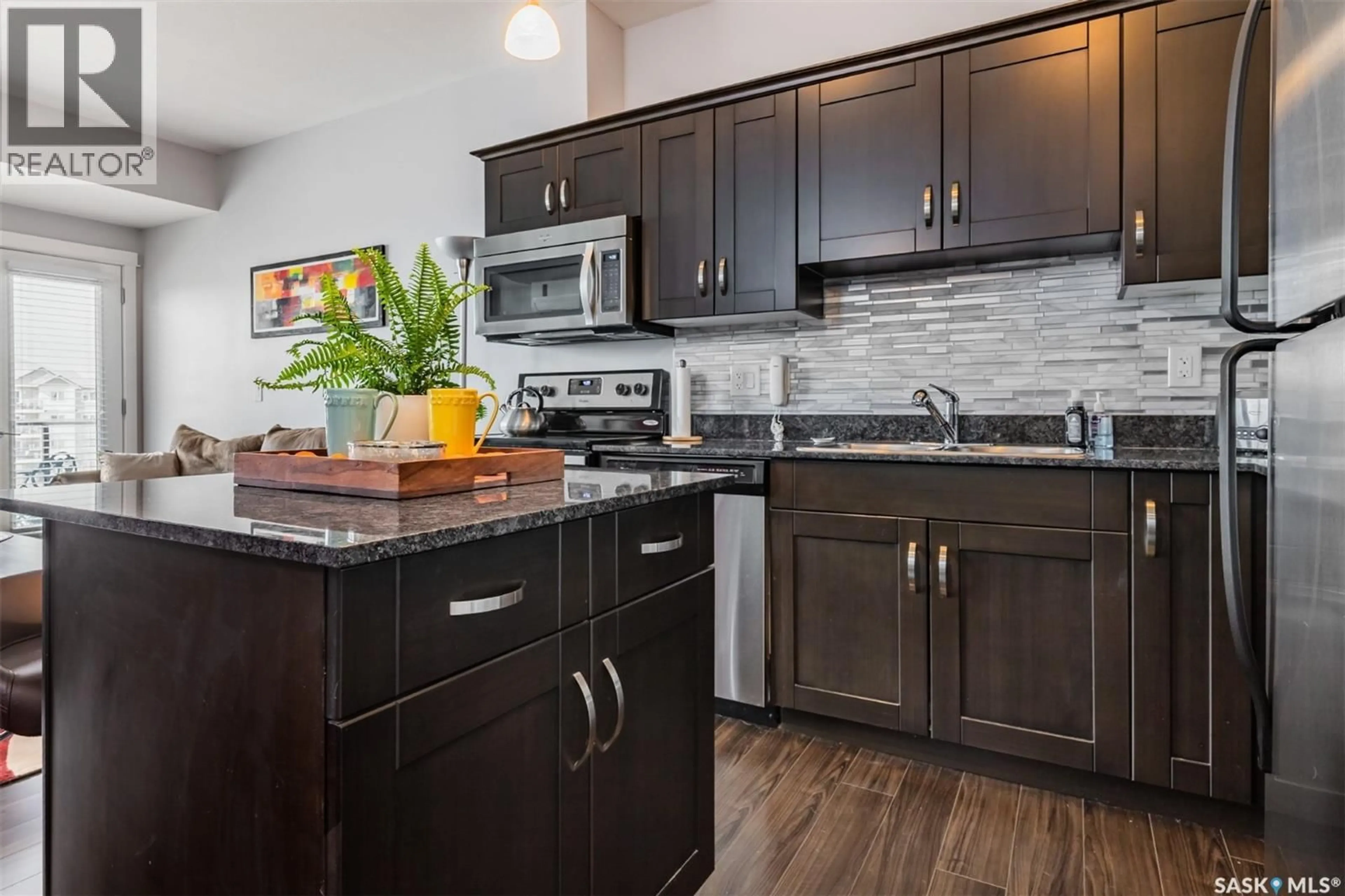 Open concept kitchen, unknown for 307 - 710 HART ROAD, Saskatoon Saskatchewan S7M1L2
