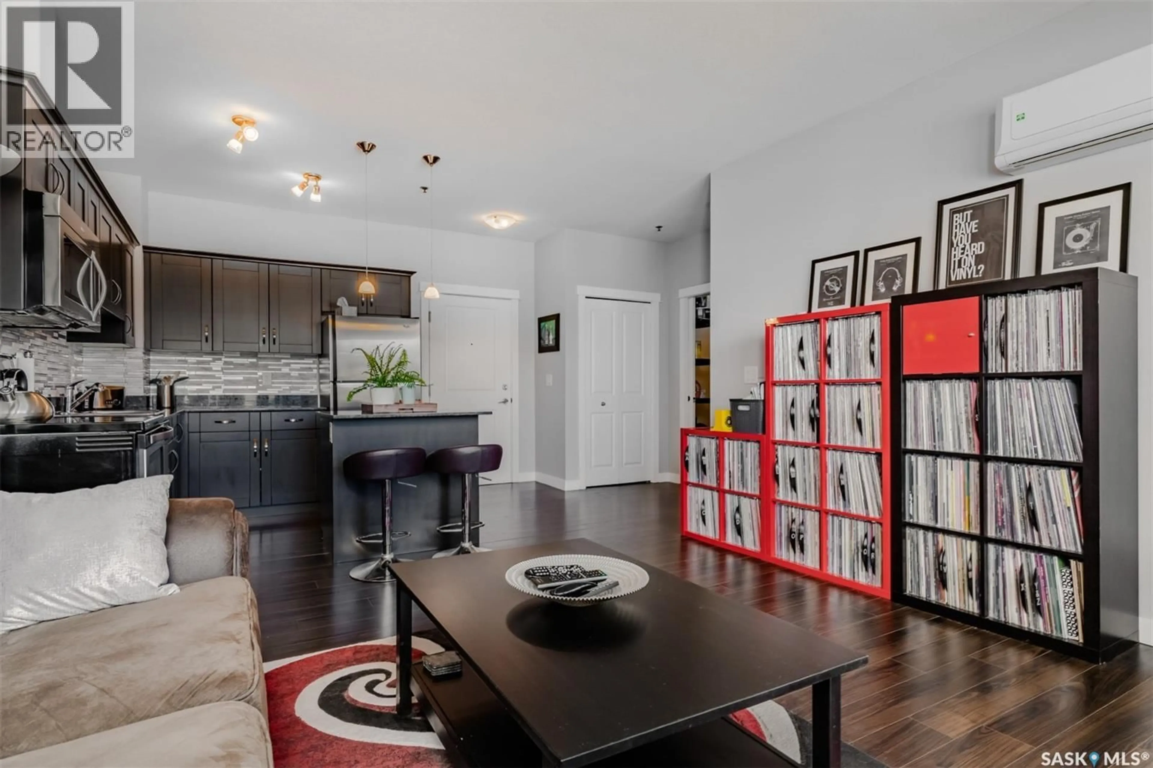 Open concept kitchen, wood/laminate floor for 307 - 710 HART ROAD, Saskatoon Saskatchewan S7M1L2