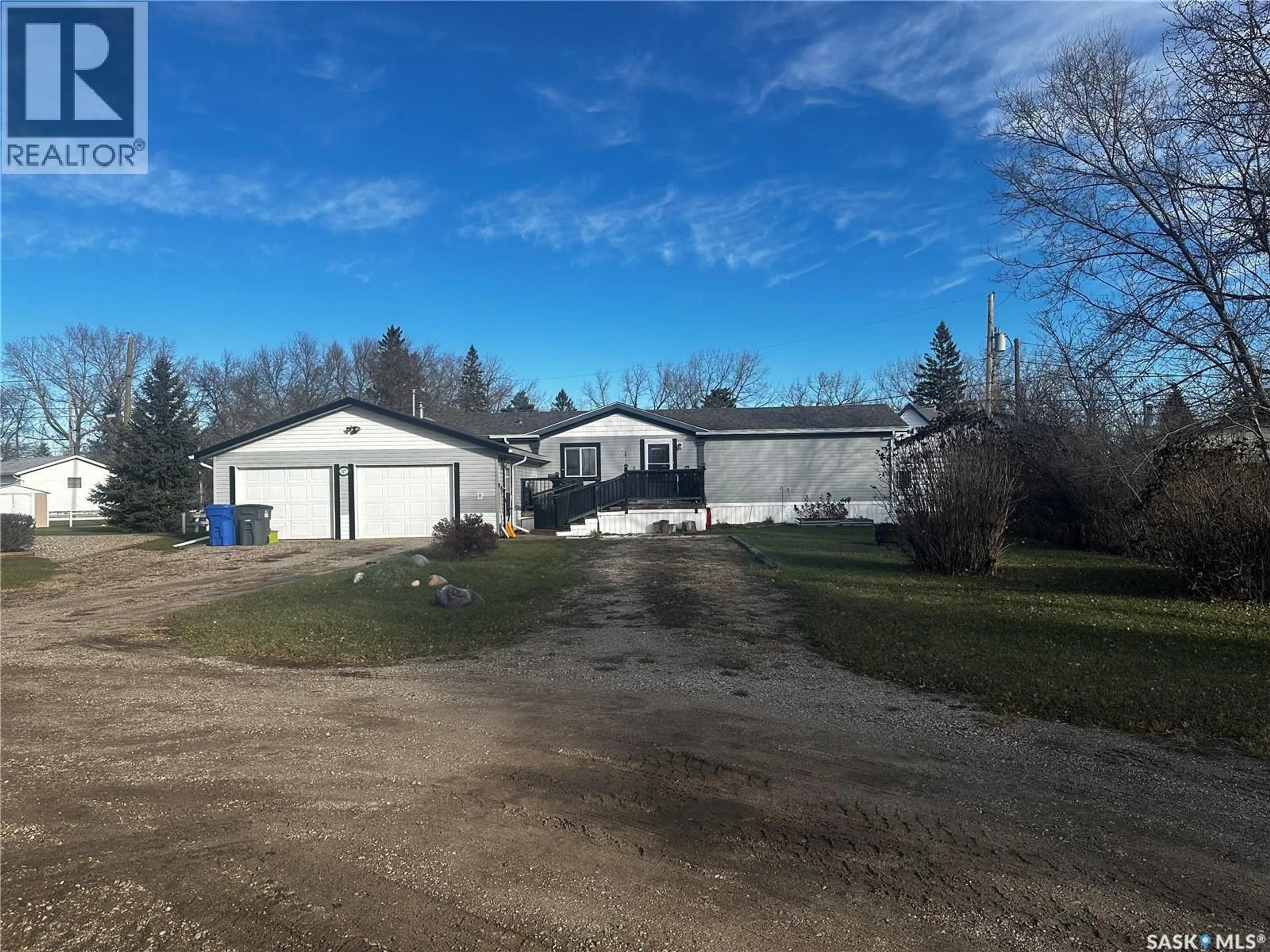 A pic from outside/outdoor area/front of a property/back of a property/a pic from drone, street for 317 RAILWAY CRESCENT, Midale Saskatchewan S0C1S0