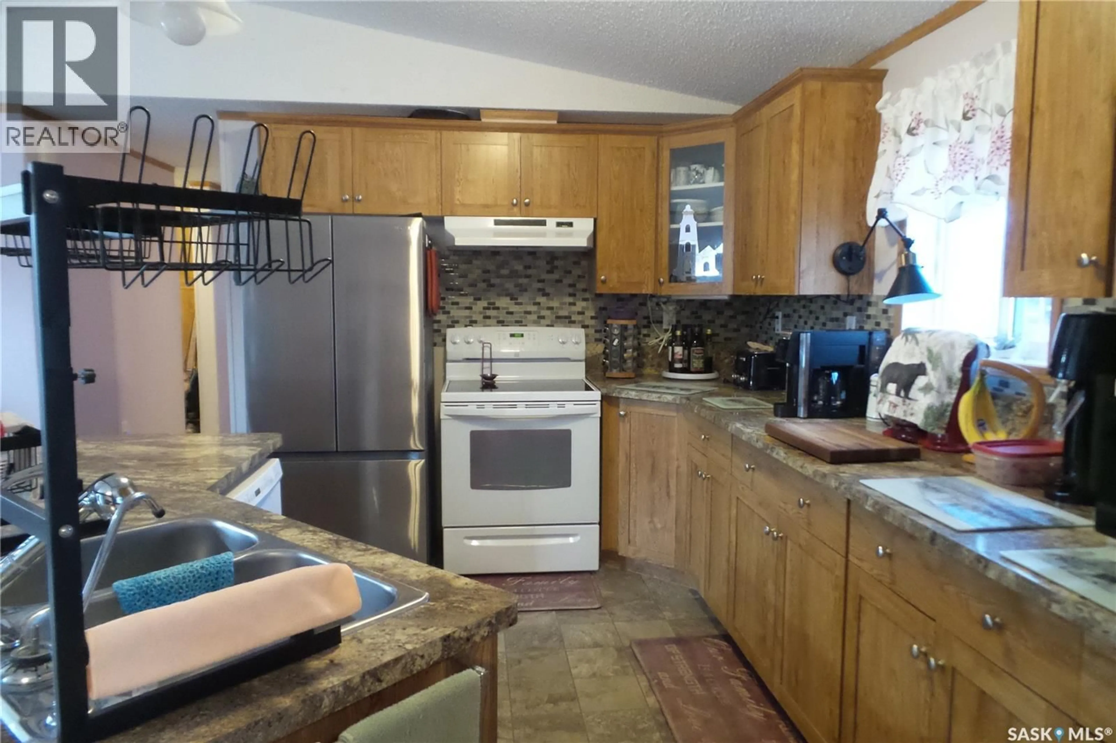 Standard kitchen, ceramic/tile floor for 317 RAILWAY CRESCENT, Midale Saskatchewan S0C1S0