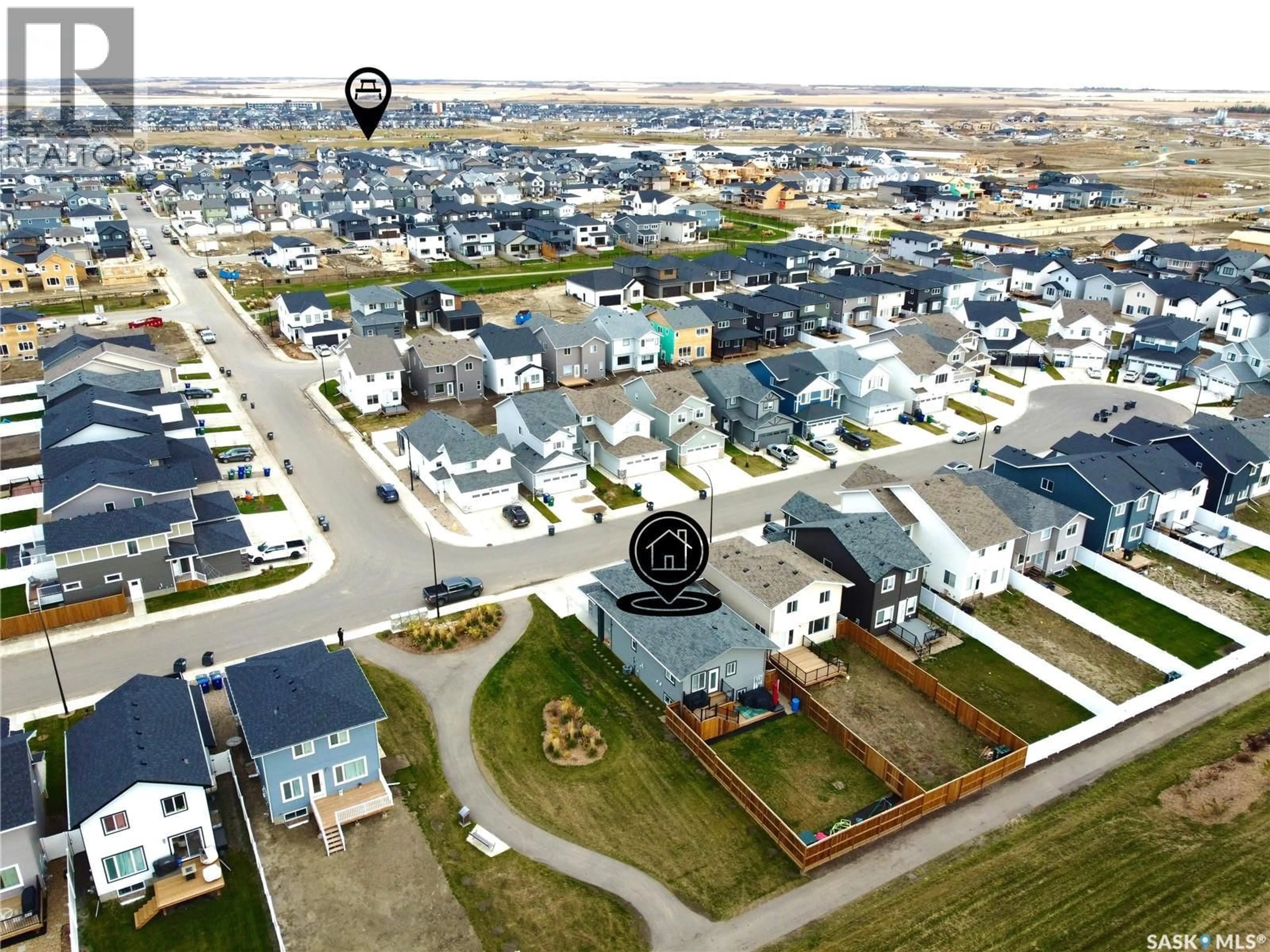 A pic from outside/outdoor area/front of a property/back of a property/a pic from drone, street for 302 PEPPER PLACE, Saskatoon Saskatchewan S7V1S7