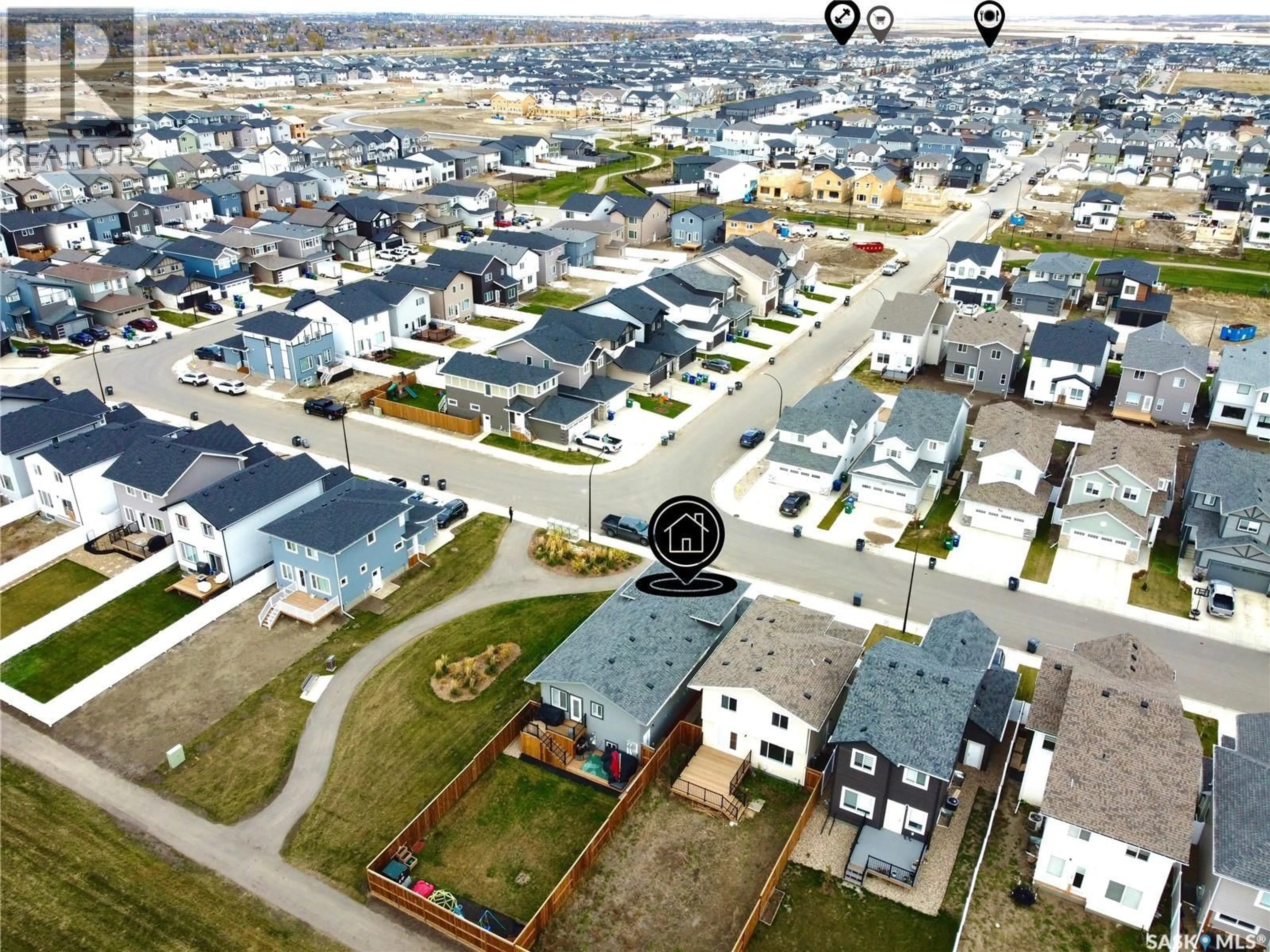 A pic from outside/outdoor area/front of a property/back of a property/a pic from drone, street for 302 PEPPER PLACE, Saskatoon Saskatchewan S7V1S7
