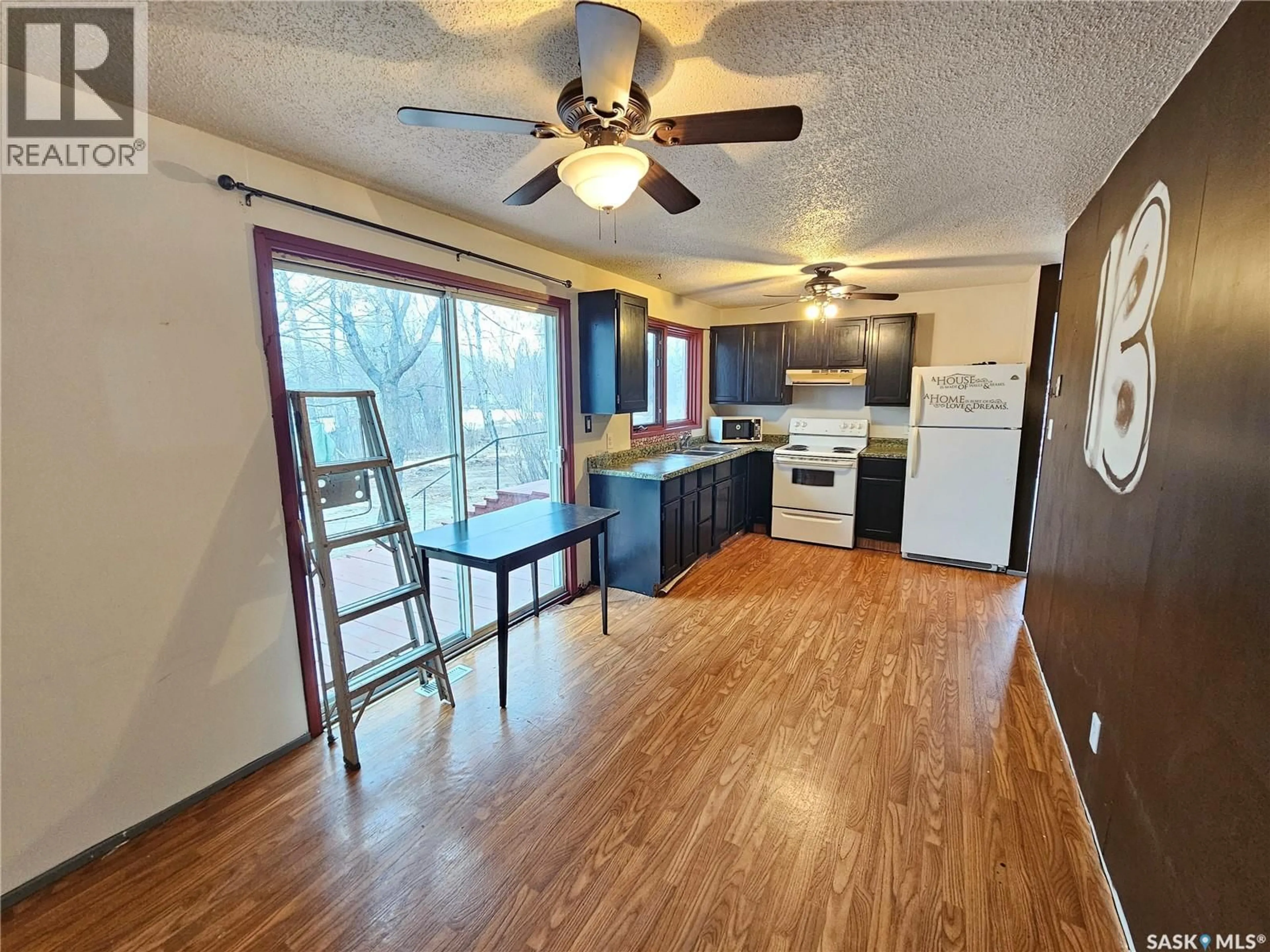 Open concept kitchen, wood/laminate floor for 3 GREEN STREET, Meadow Lake Rm No.588 Saskatchewan S0M2M0