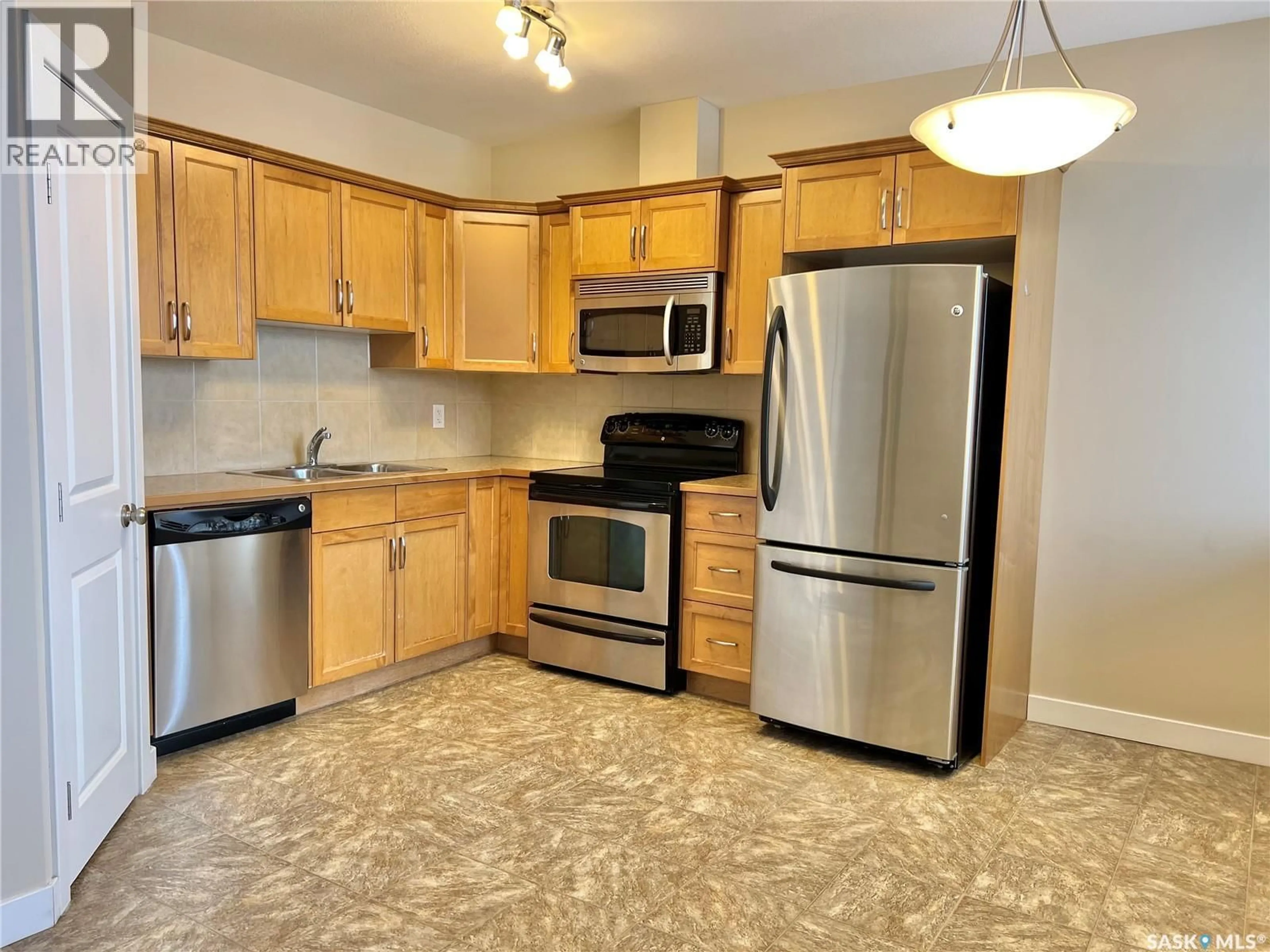 Standard kitchen, unknown for 302 - 112 BEMISTER AVENUE E, Melfort Saskatchewan S0E1A0
