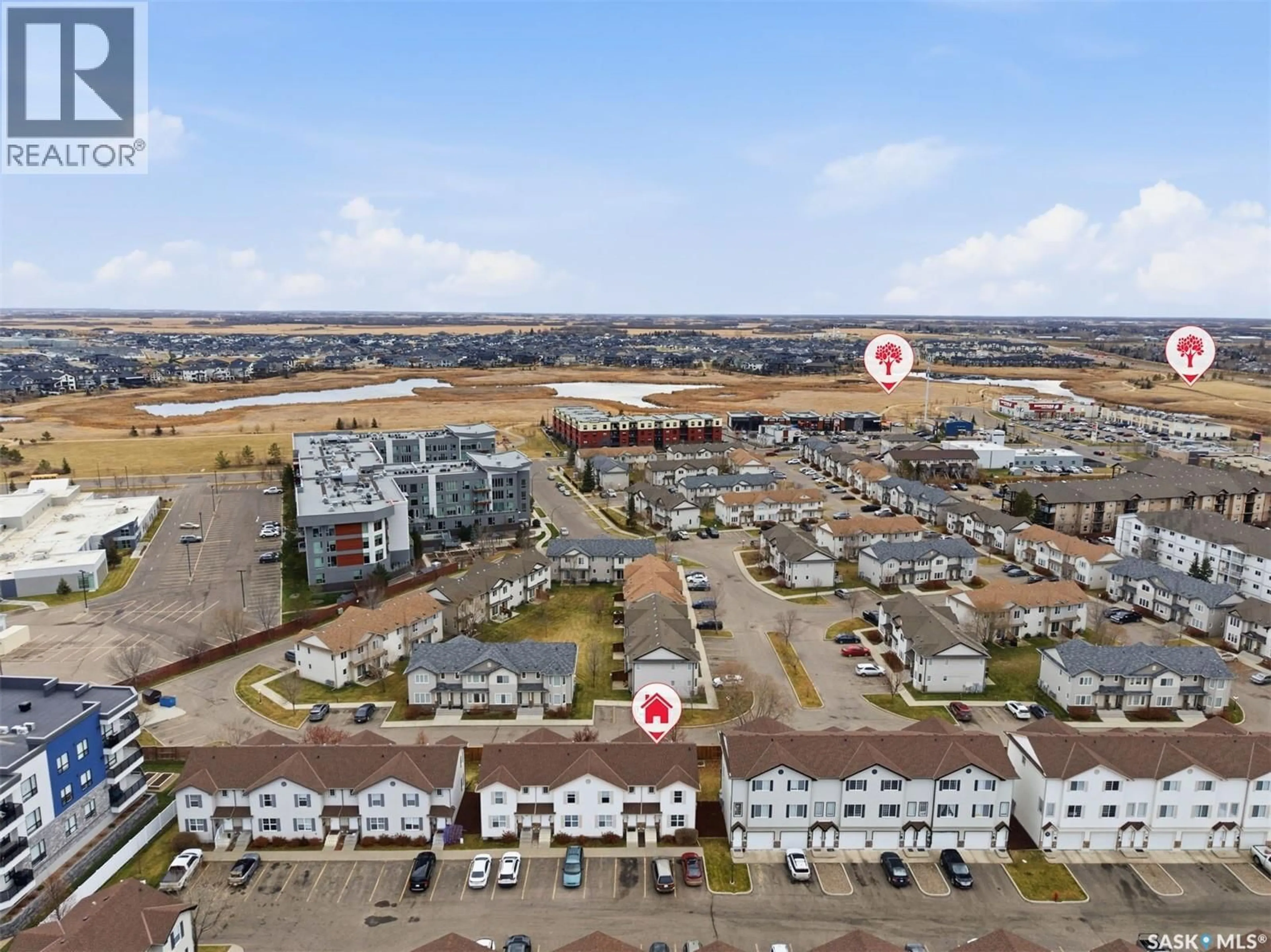 A pic from outside/outdoor area/front of a property/back of a property/a pic from drone, unknown for 68 135 PAWLYCHENKO LANE, Saskatoon Saskatchewan S7V1J8