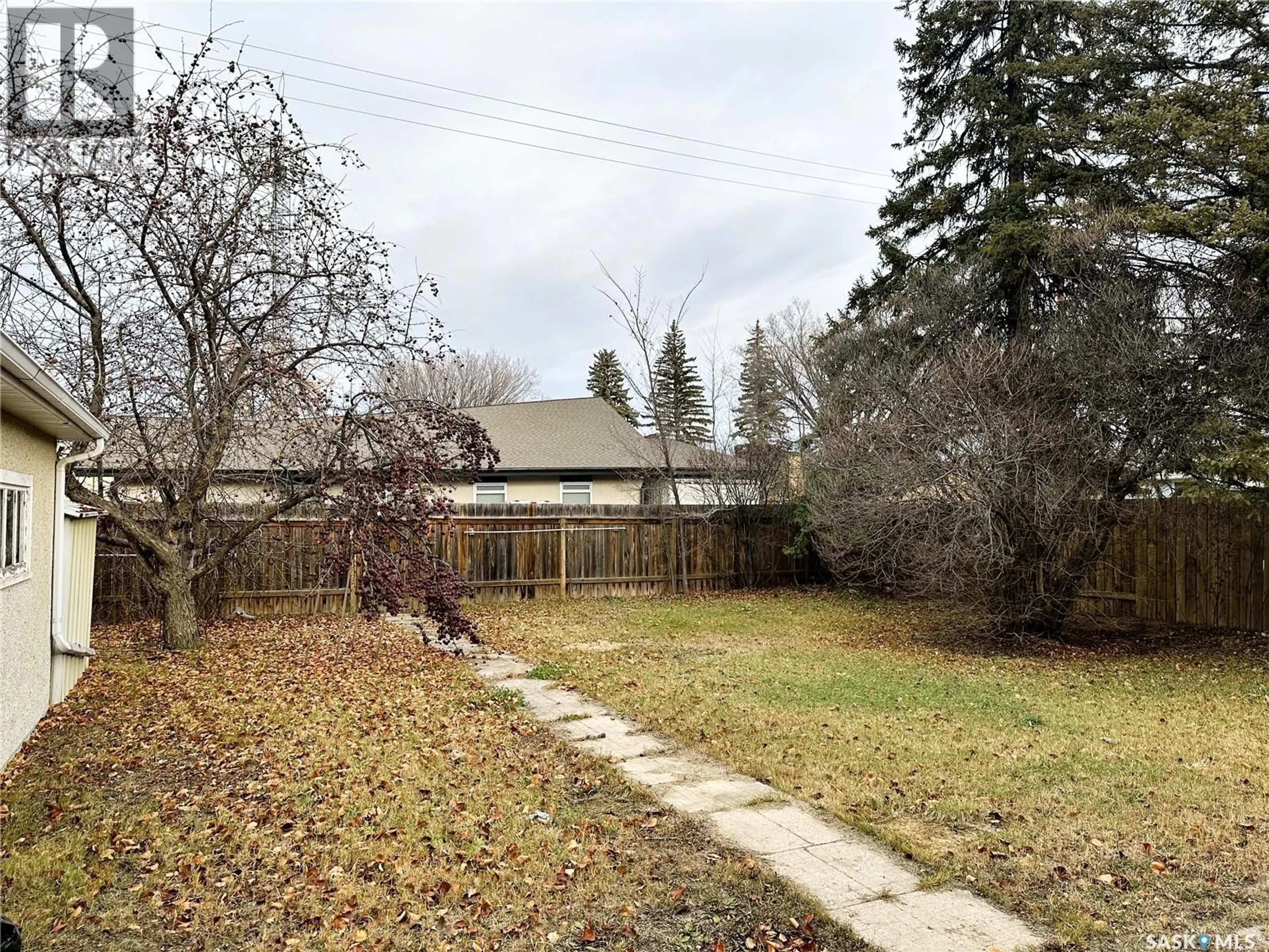 A pic from outside/outdoor area/front of a property/back of a property/a pic from drone, unknown for 87 TUCKER CRESCENT, Saskatoon Saskatchewan S7H3H7