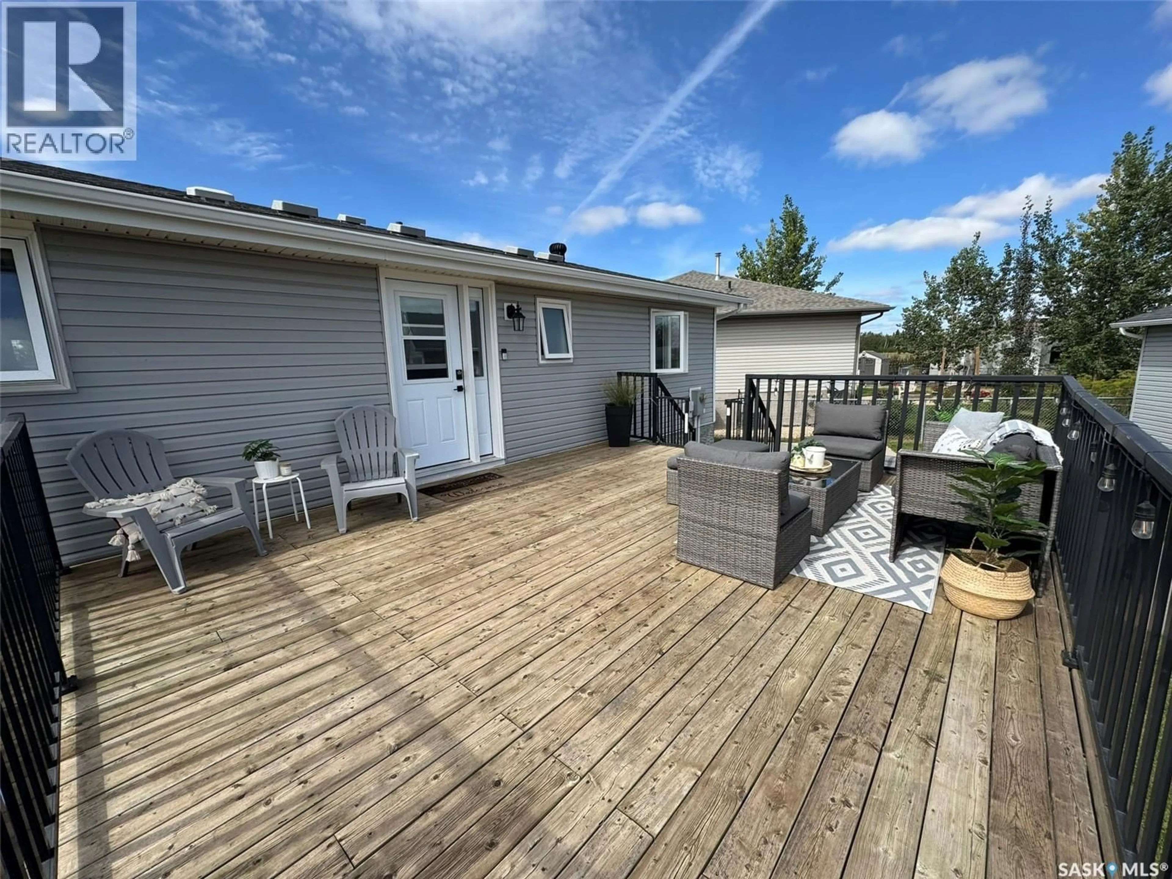 Patio, water/lake/river/ocean view for 16 MANOR BAY, Carlyle Saskatchewan S0C0R0
