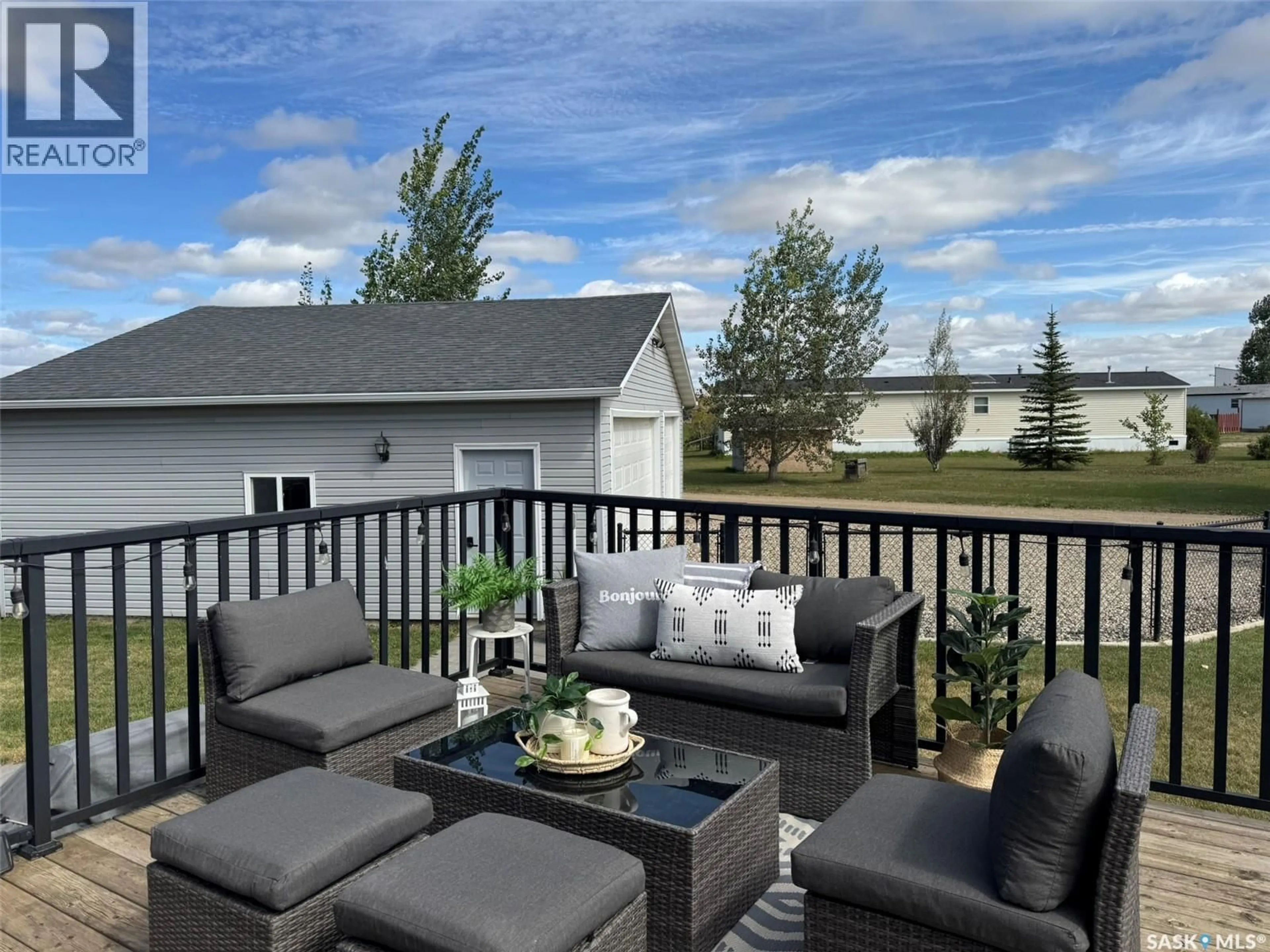 Patio, water/lake/river/ocean view for 16 MANOR BAY, Carlyle Saskatchewan S0C0R0