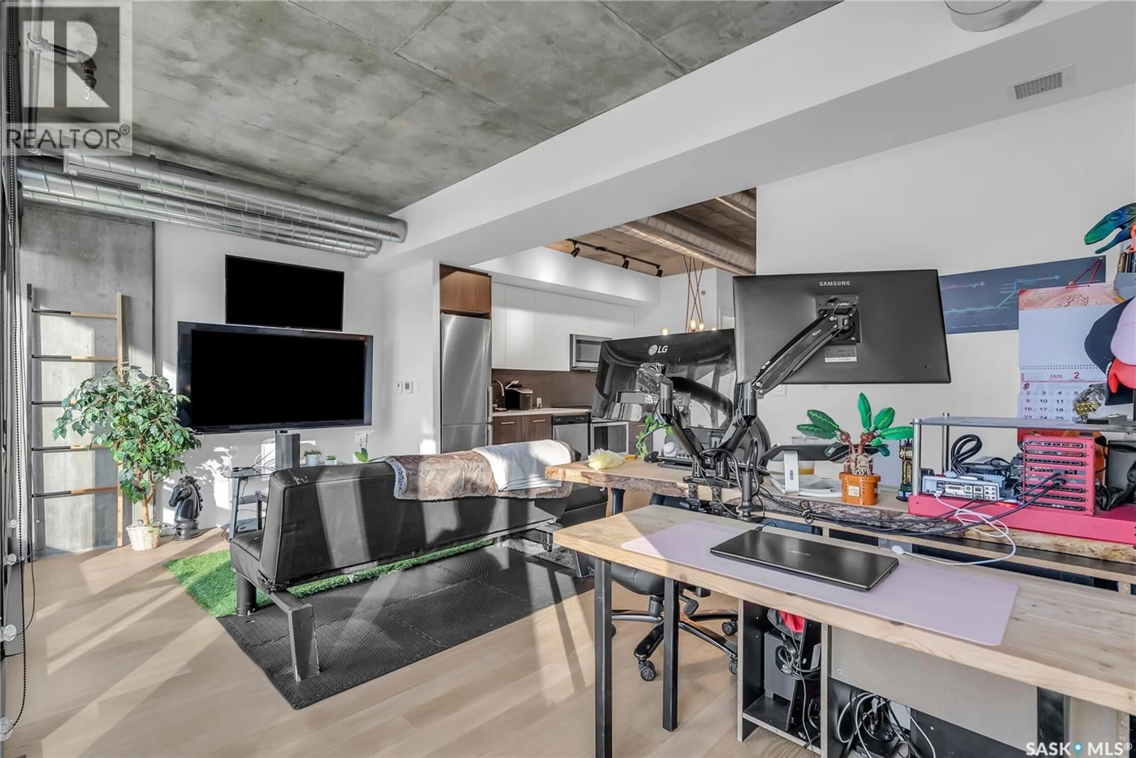 Open concept kitchen, cement floor for 205 - 490 2ND AVENUE S, Saskatoon Saskatchewan