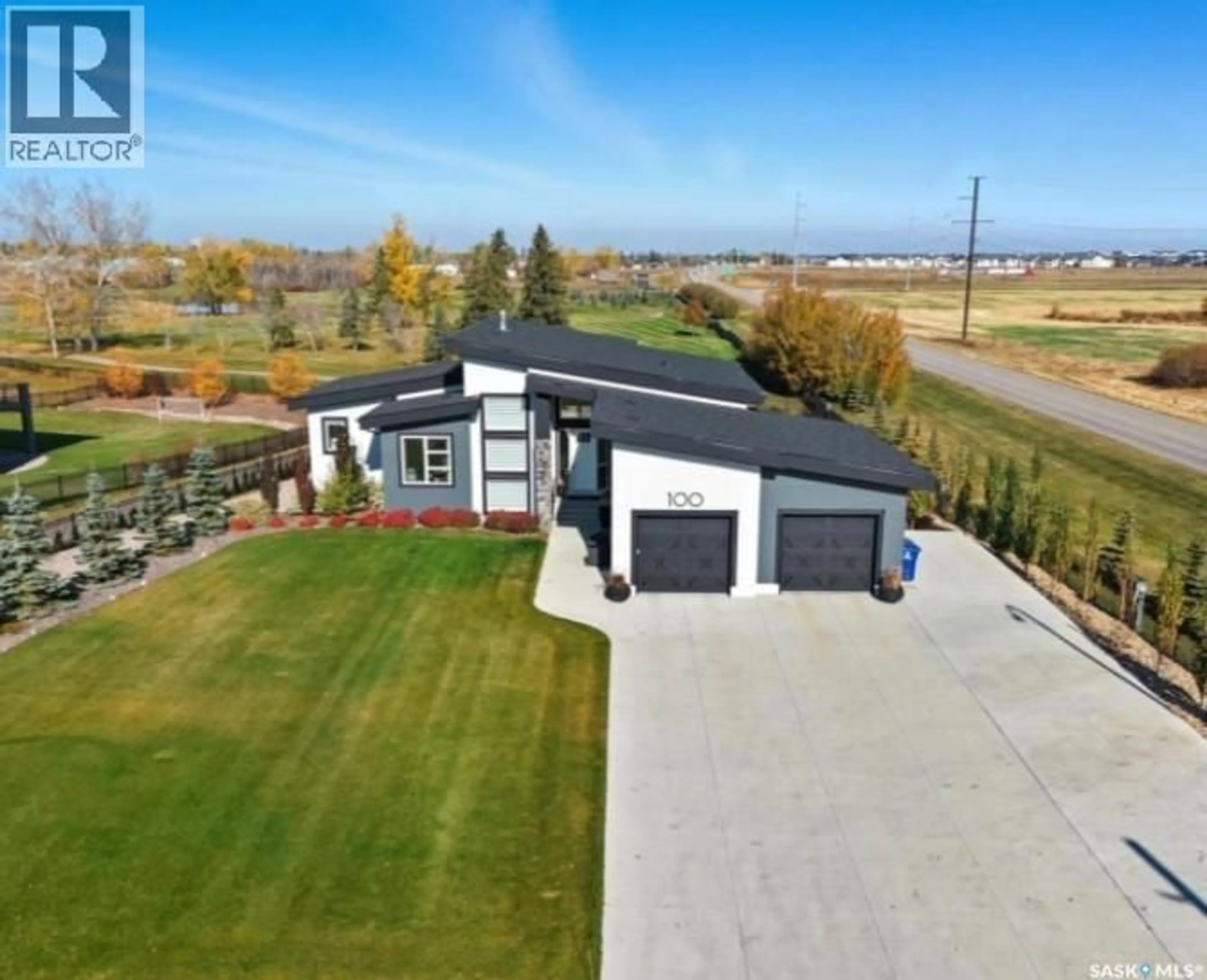 A pic from outside/outdoor area/front of a property/back of a property/a pic from drone, water/lake/river/ocean view for 100 GREENBRYRE CRESCENT, Corman Park Rm No. 344 Saskatchewan S7V0J5
