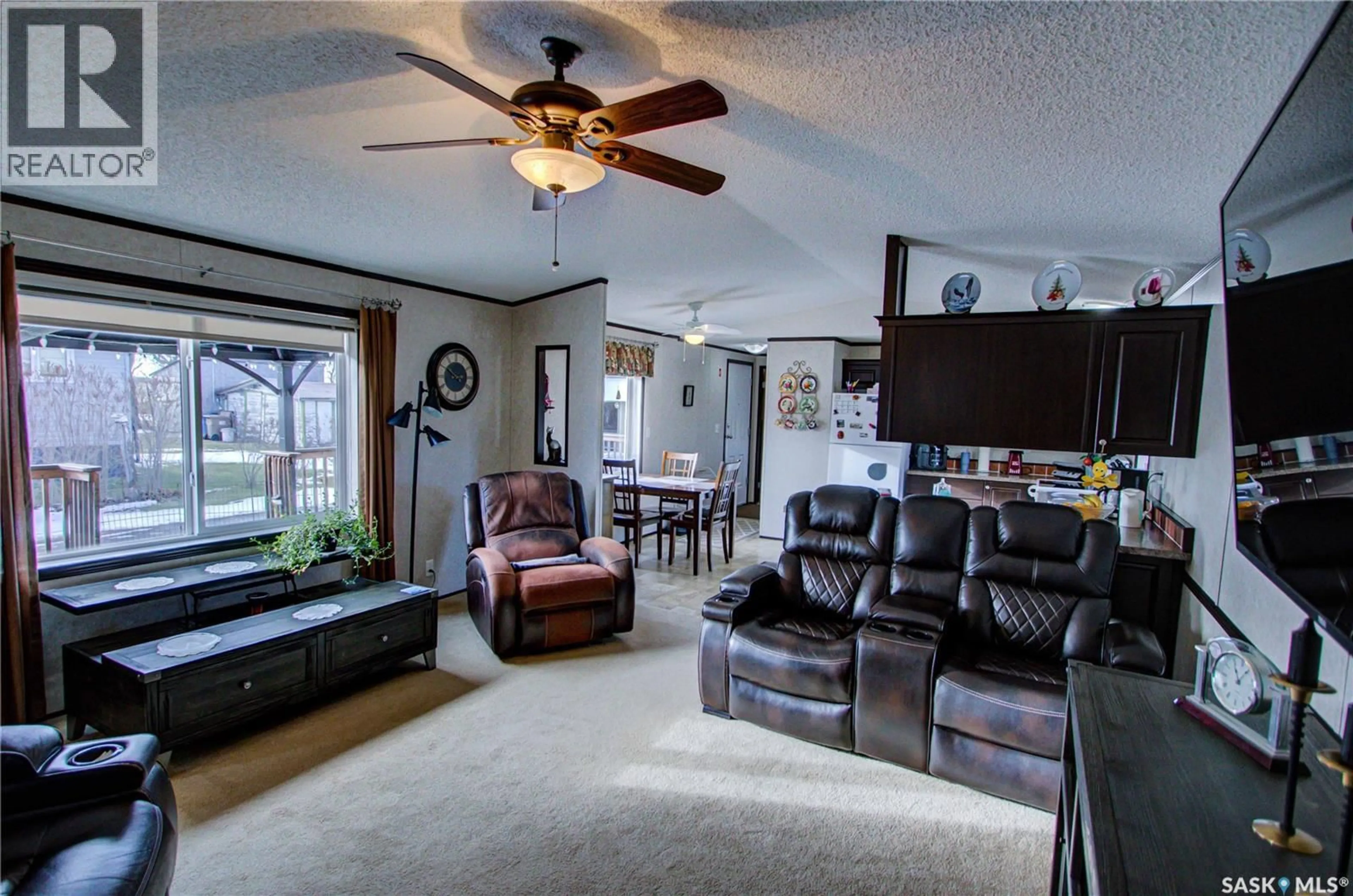 Living room with furniture, unknown for 105 RUTTLE AVENUE, Kinistino Saskatchewan S0J1H0