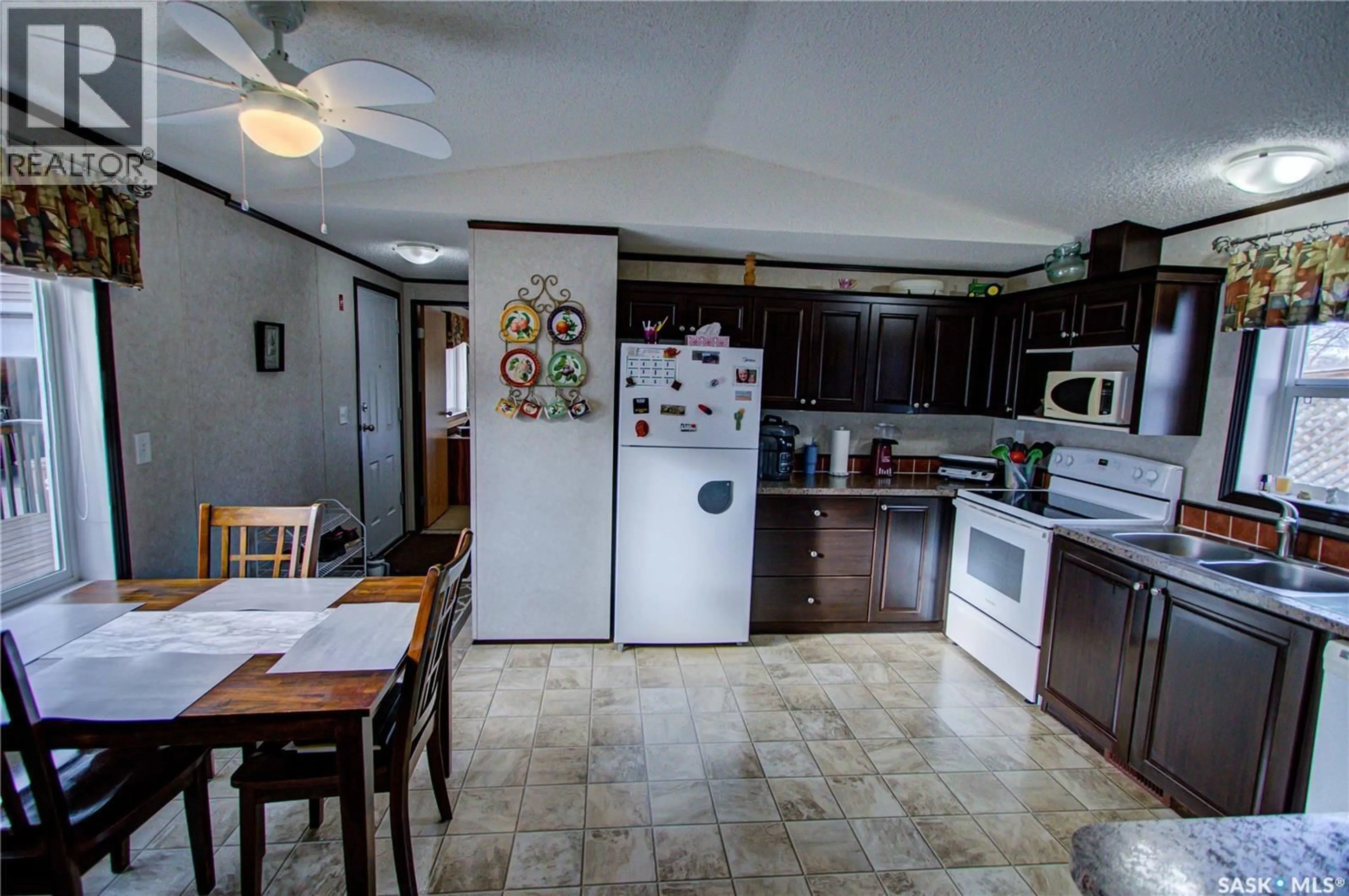 Standard kitchen, ceramic/tile floor for 105 RUTTLE AVENUE, Kinistino Saskatchewan S0J1H0