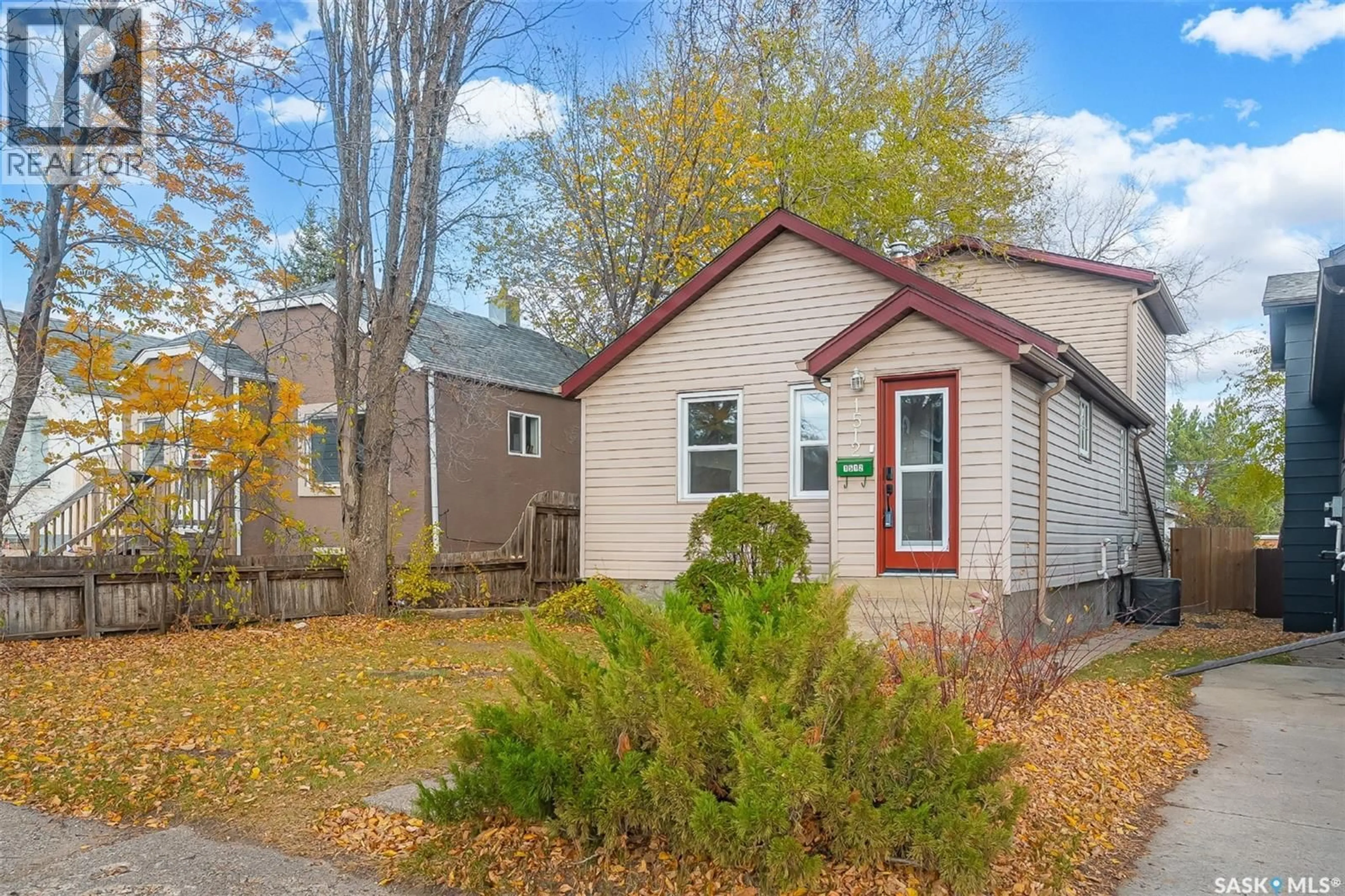Home with vinyl exterior material, street for 1512 7TH AVENUE, Saskatoon Saskatchewan S7K2W5