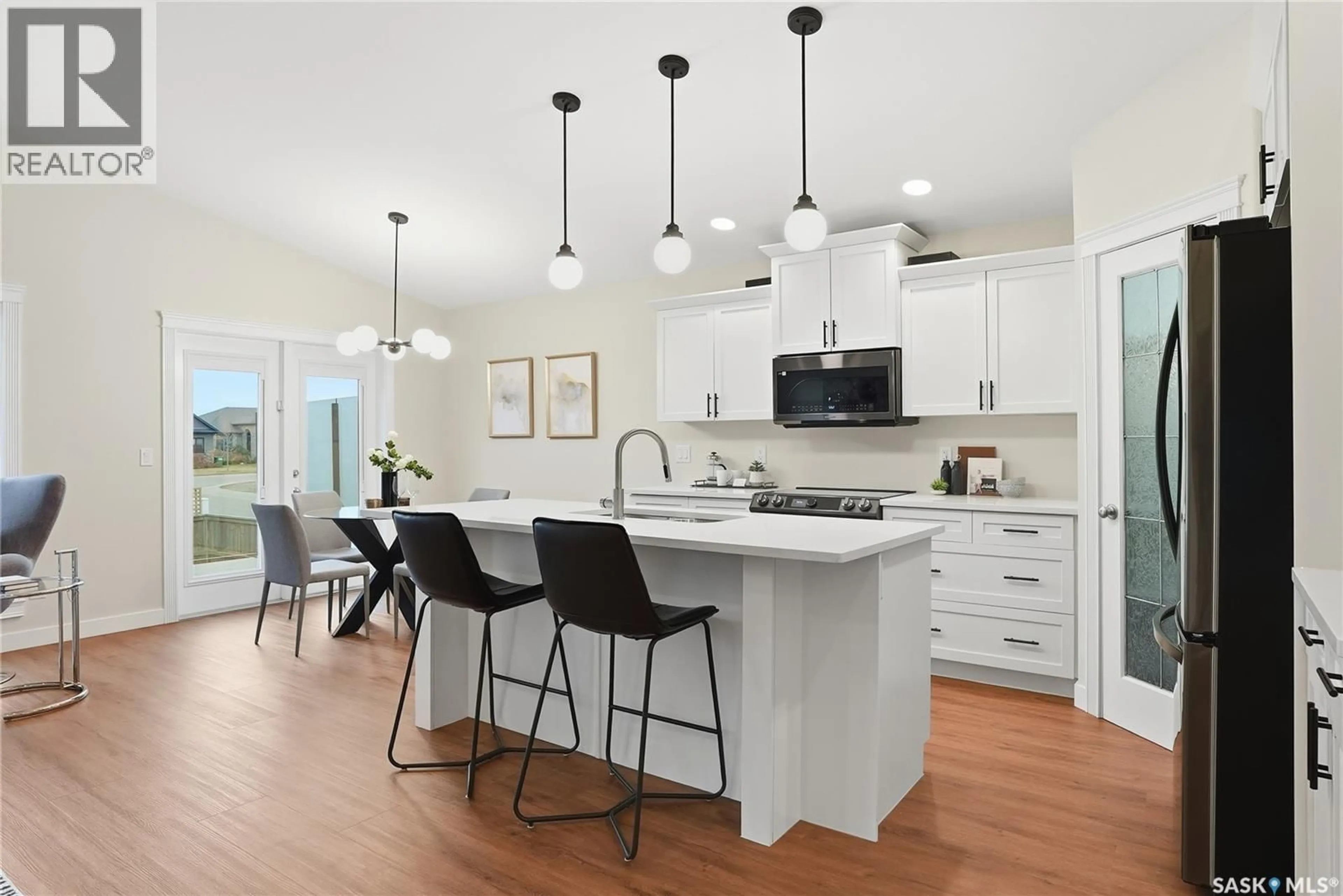 Open concept kitchen, unknown for 703 BEECHDALE WAY, Saskatoon Saskatchewan S7V0A5