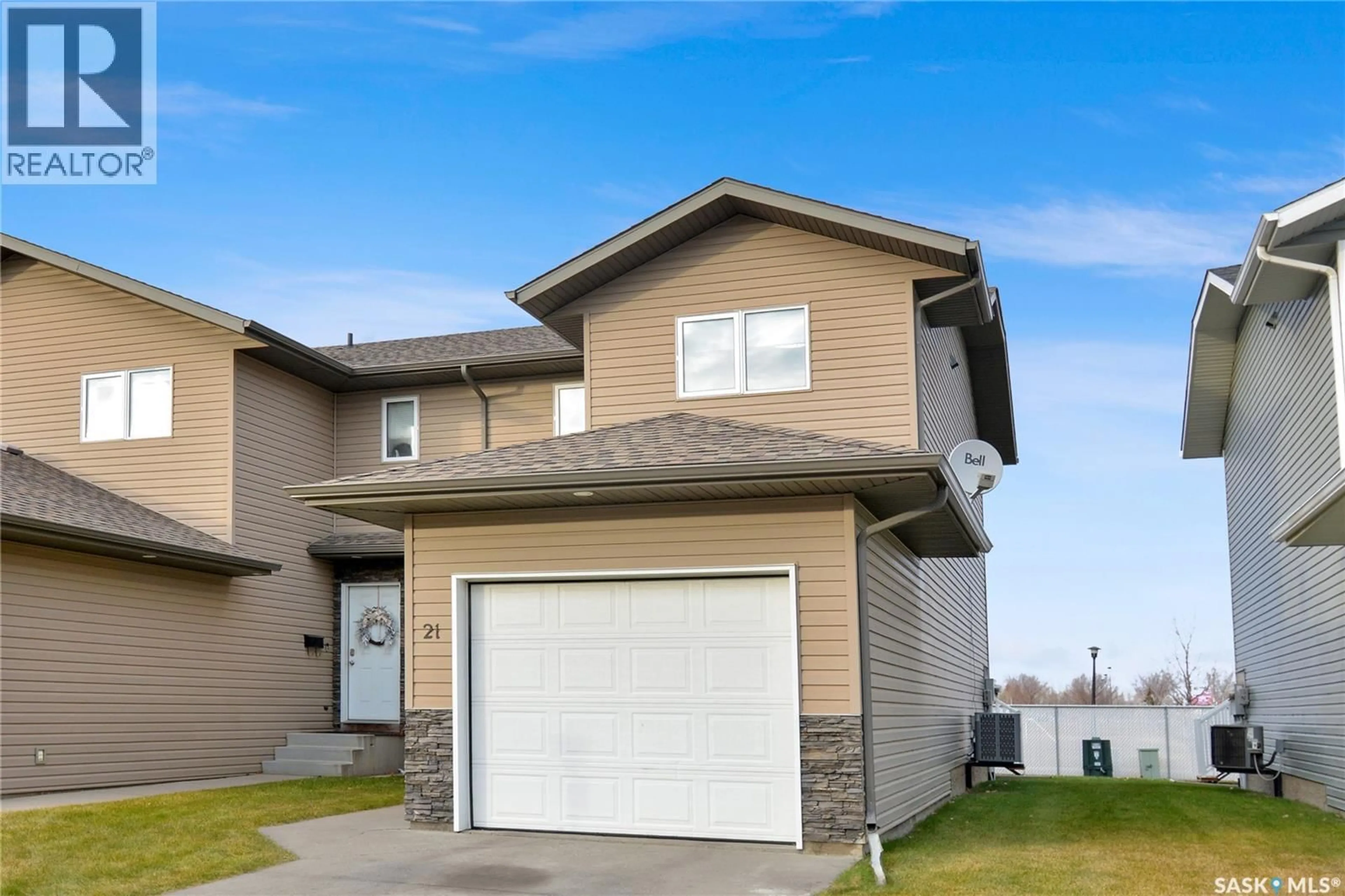 Home with vinyl exterior material, street for 21 515 CENTENNIAL BOULEVARD, Warman Saskatchewan S0K1A0