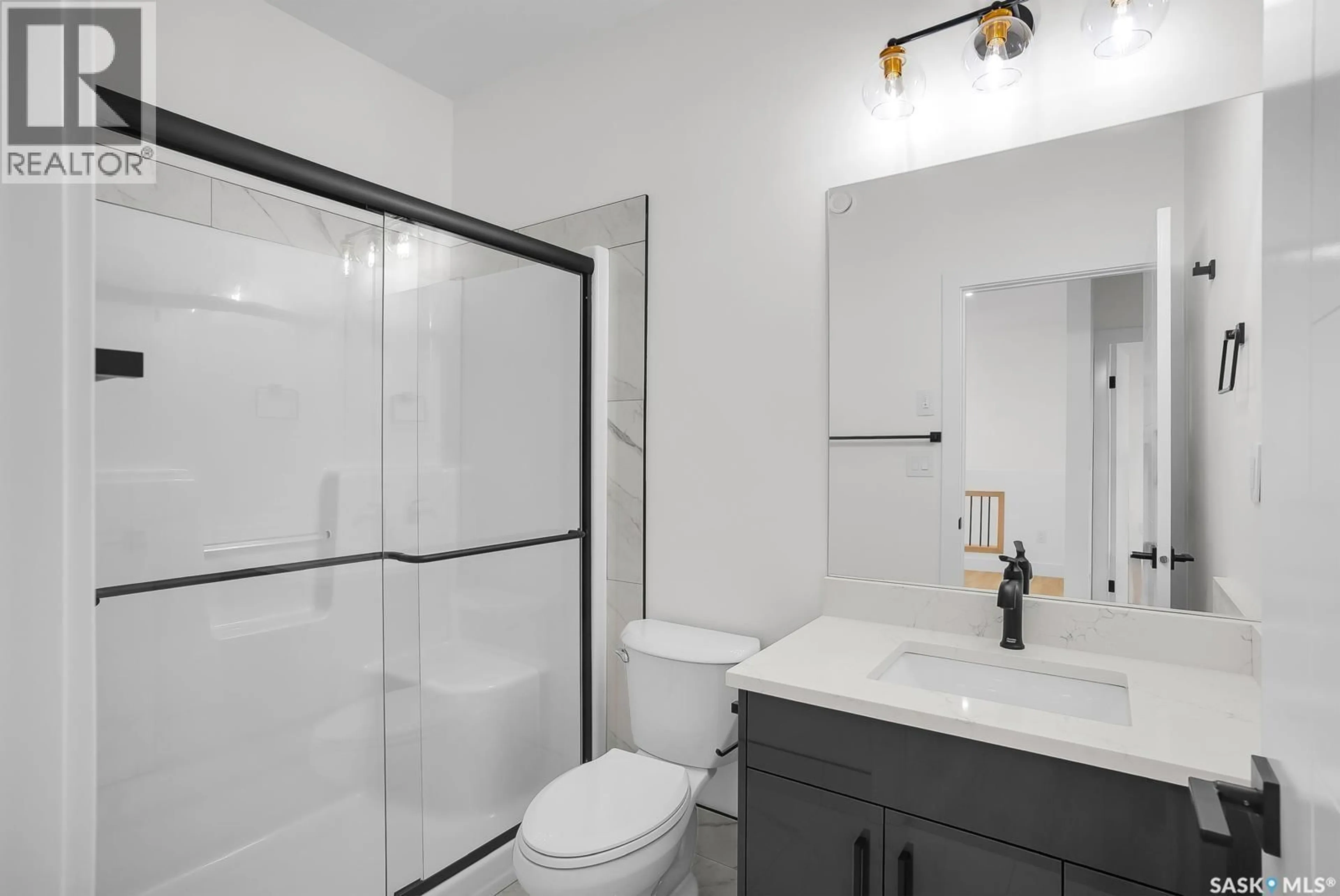 Standard bathroom, ceramic/tile floor for 207 TASKAMANWA STREET, Saskatoon Saskatchewan S7H2T2