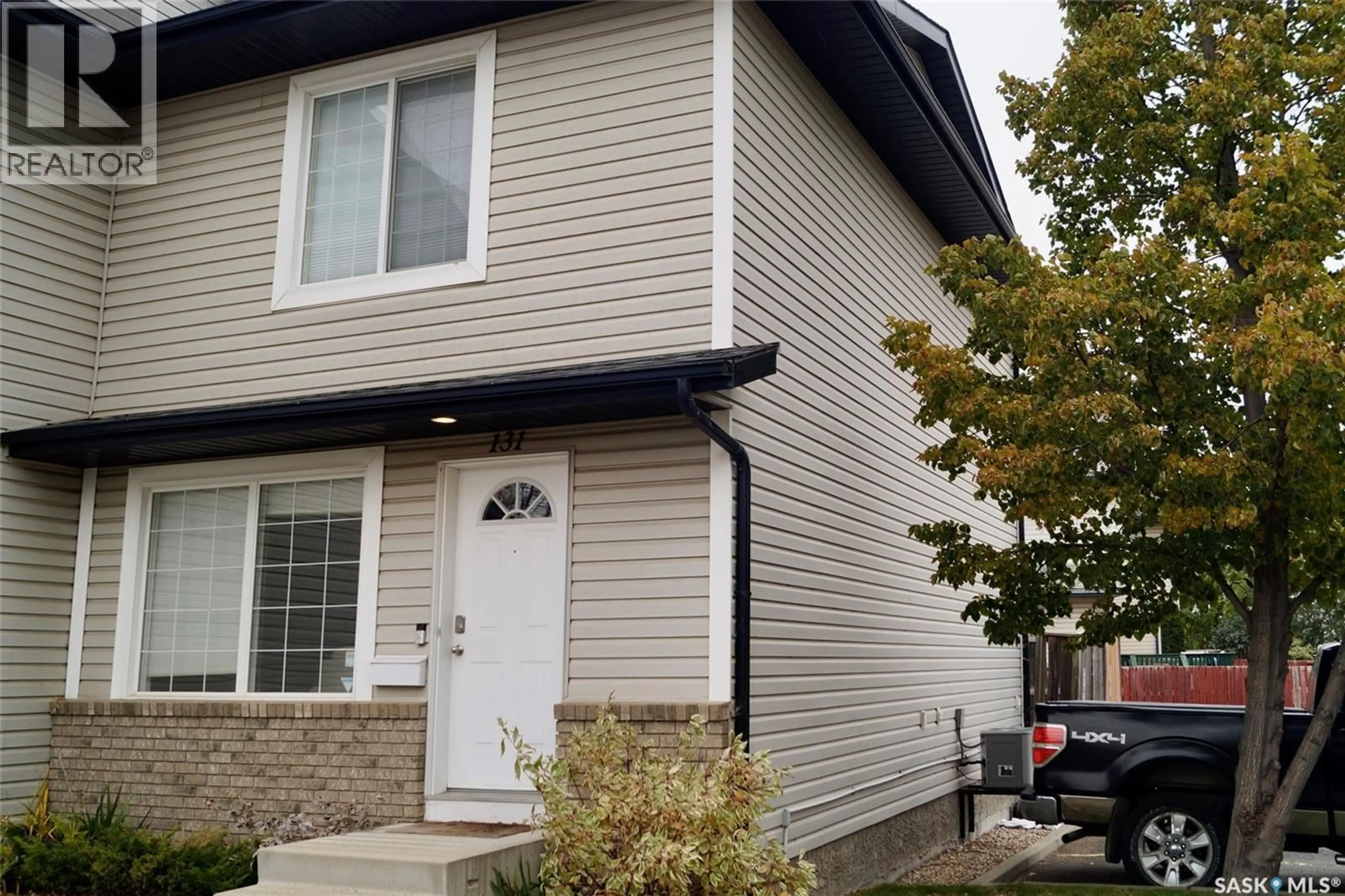 Home with vinyl exterior material, street for 103 - 131 RUTHERFORD CRESCENT, Saskatoon Saskatchewan S7N4X9