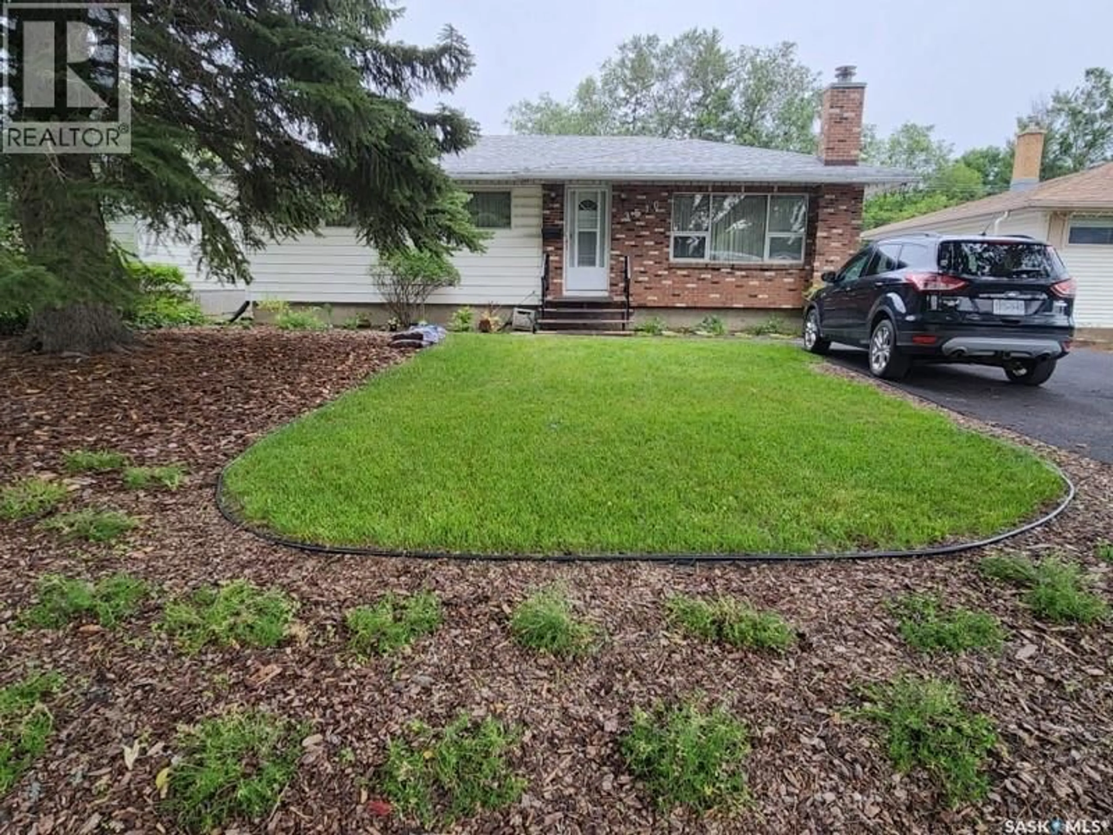 A pic from outside/outdoor area/front of a property/back of a property/a pic from drone, street for 3510 25TH AVENUE, Regina Saskatchewan S4S1L8