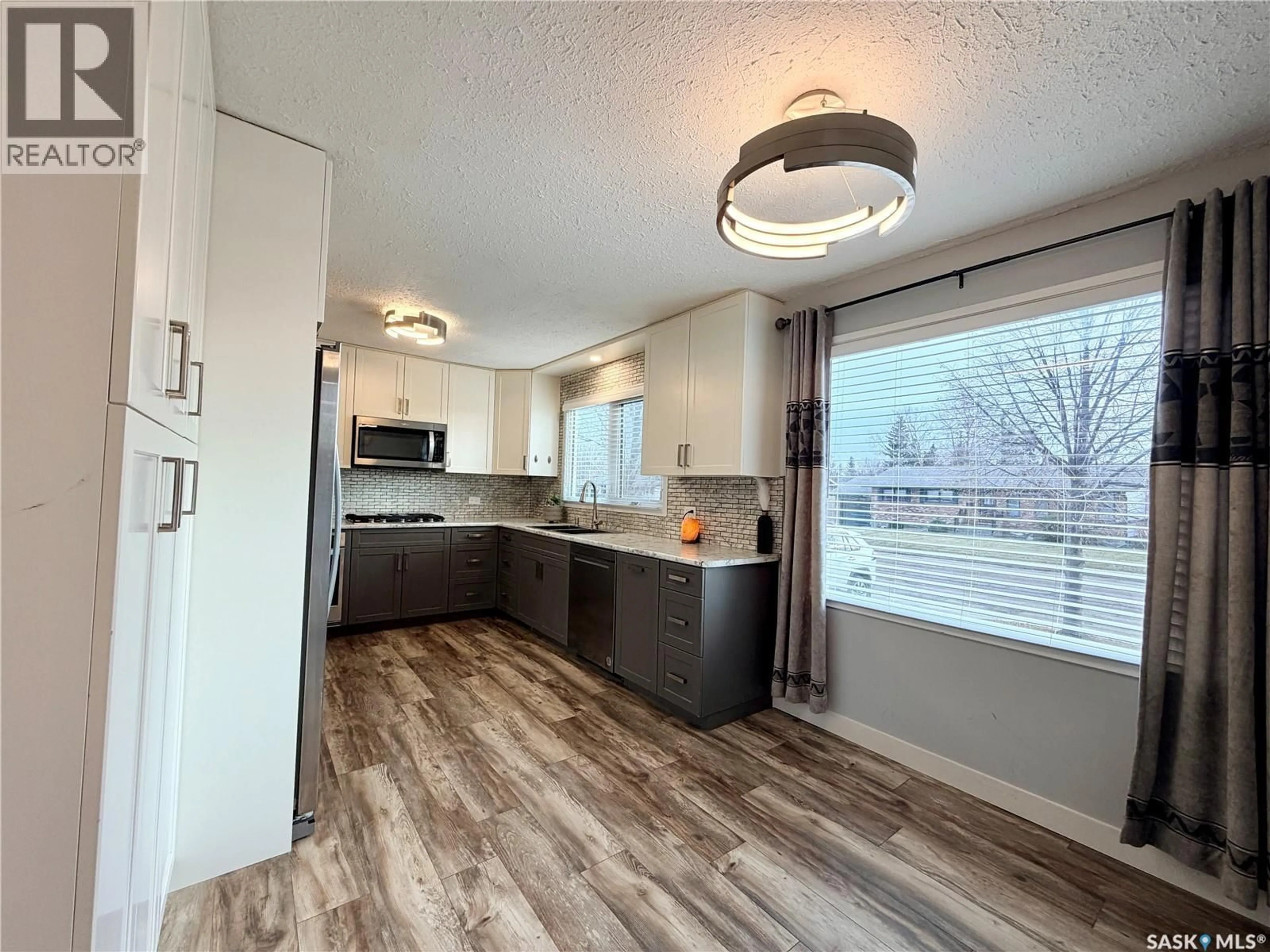 Open concept kitchen, unknown for 9019 ABBOTT AVENUE, North Battleford Saskatchewan S9A3E8