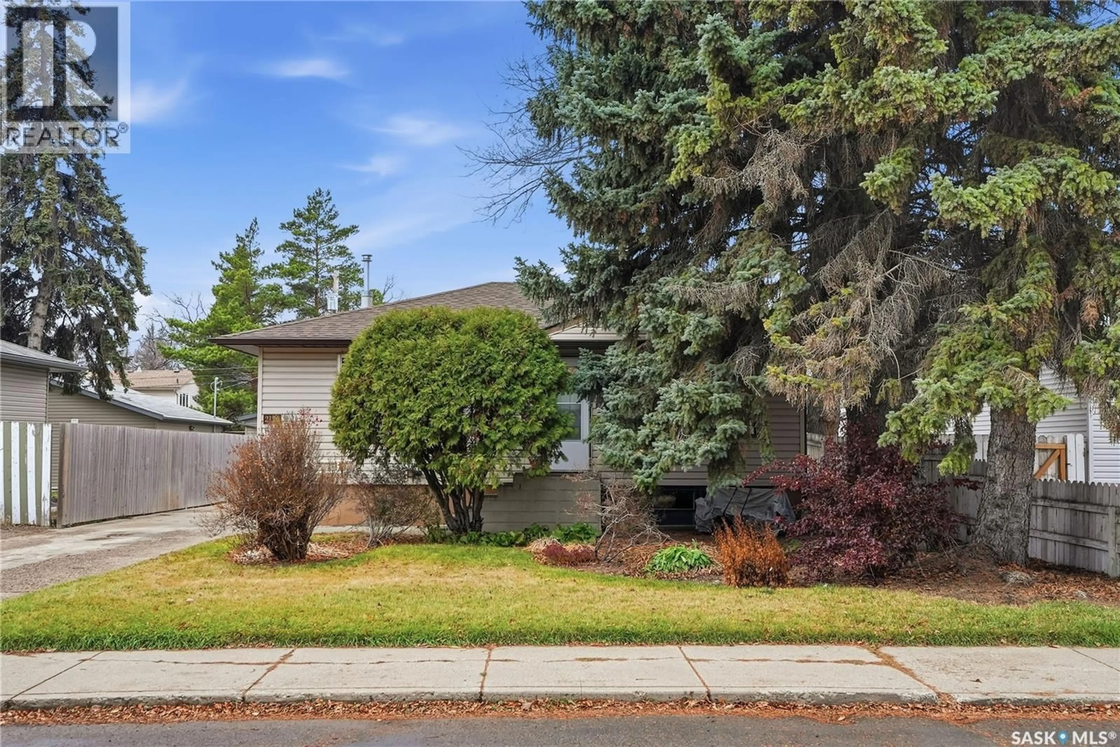 Home with vinyl exterior material, street for 2120 ST ANDREWS AVENUE, Saskatoon Saskatchewan S7M0M1