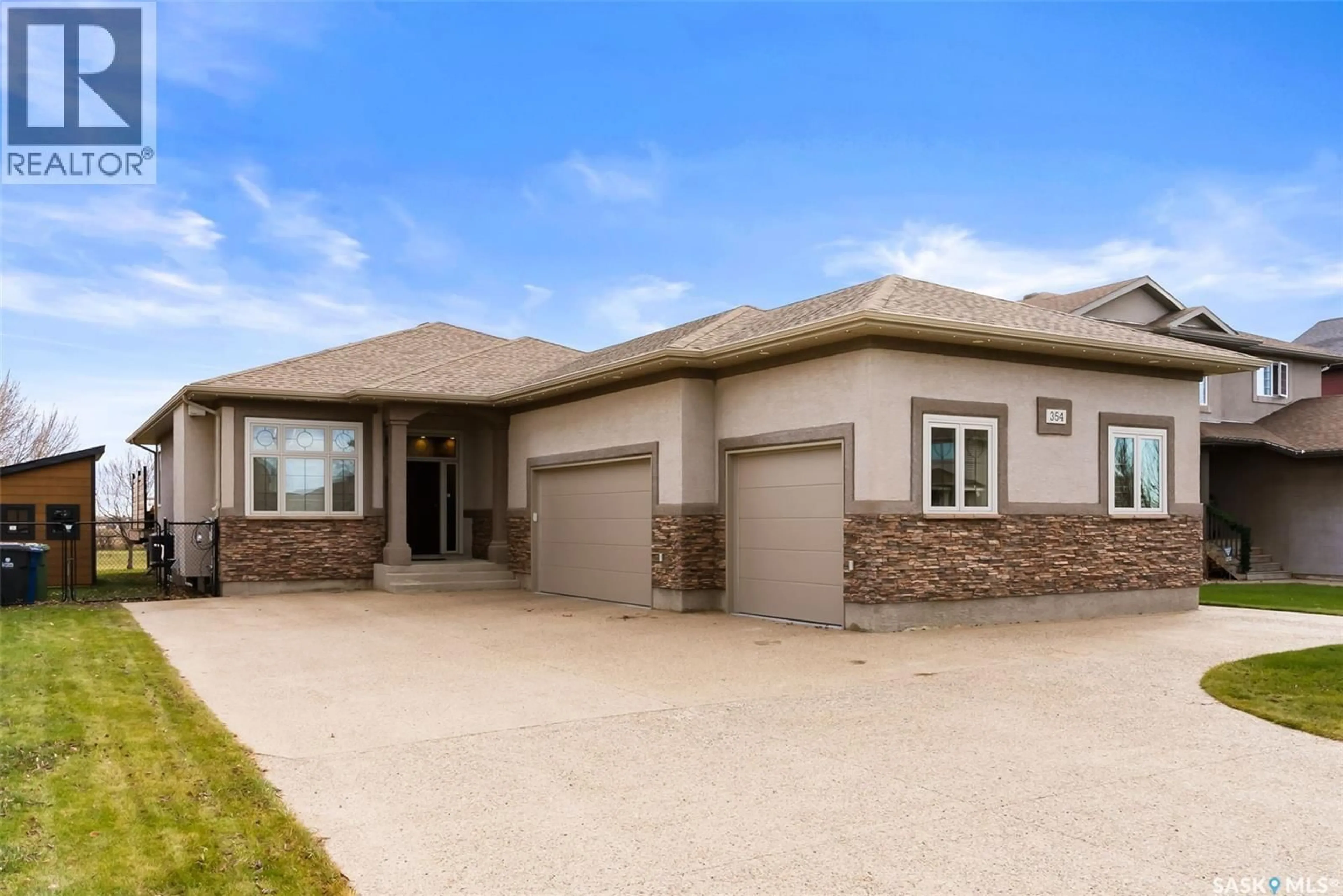 Home with brick exterior material, street for 354 FAIRWAY ROAD, White City Saskatchewan S4L0B5