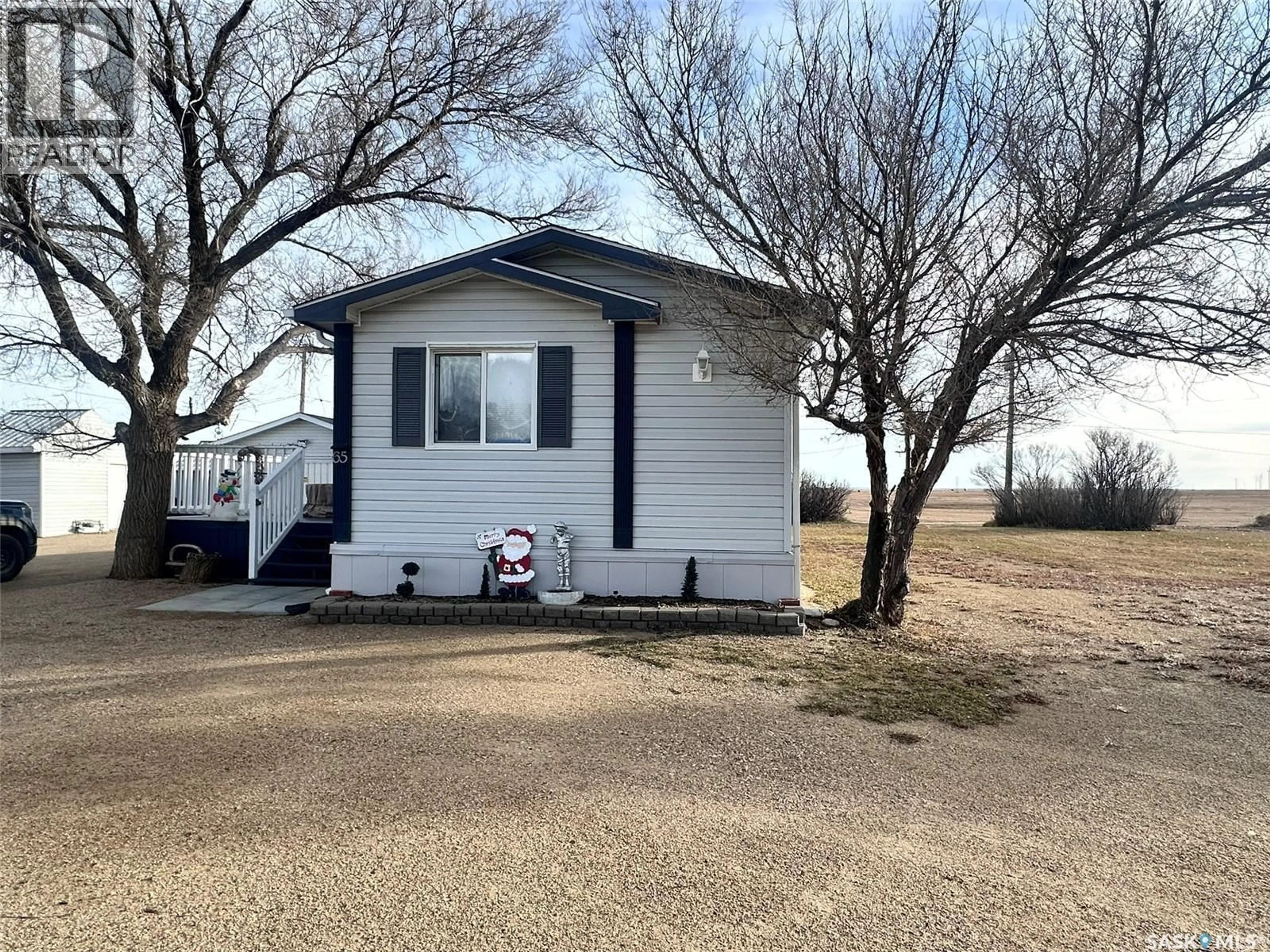 A pic from outside/outdoor area/front of a property/back of a property/a pic from drone, street for 65 SUNRISE ESTATES, Assiniboia Saskatchewan S0H0B0