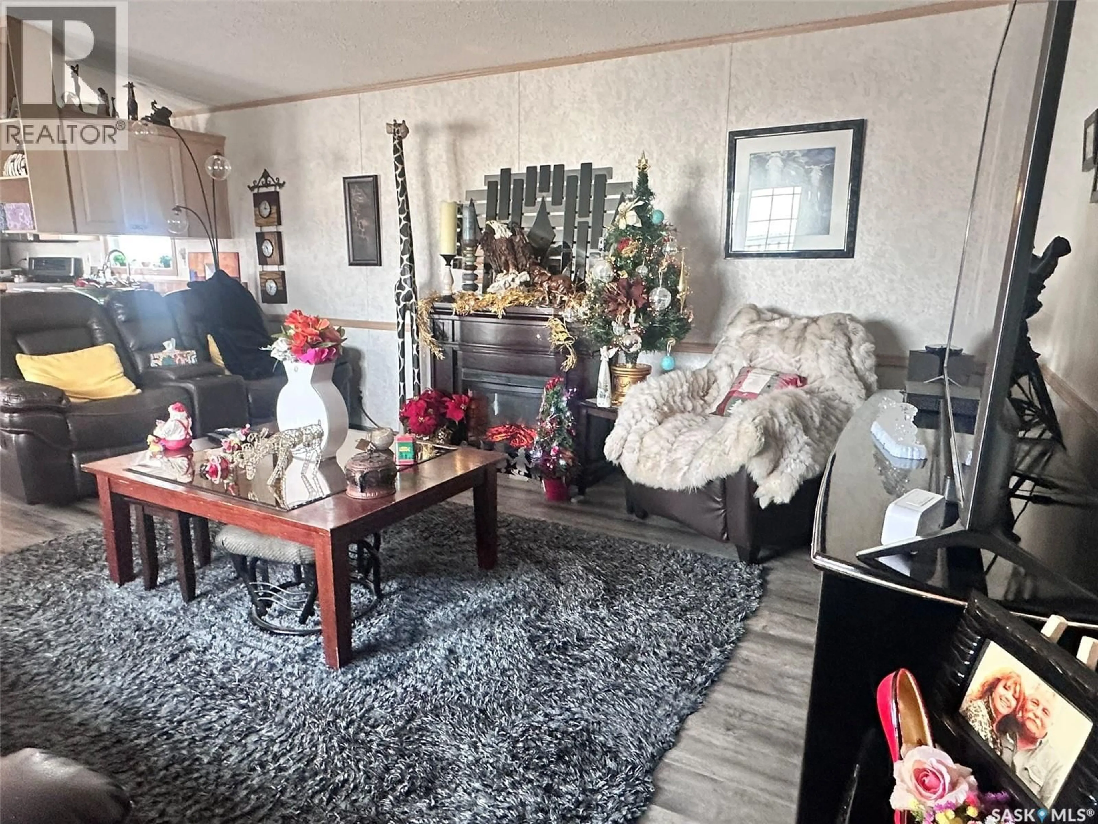Living room with furniture, unknown for 65 SUNRISE ESTATES, Assiniboia Saskatchewan S0H0B0