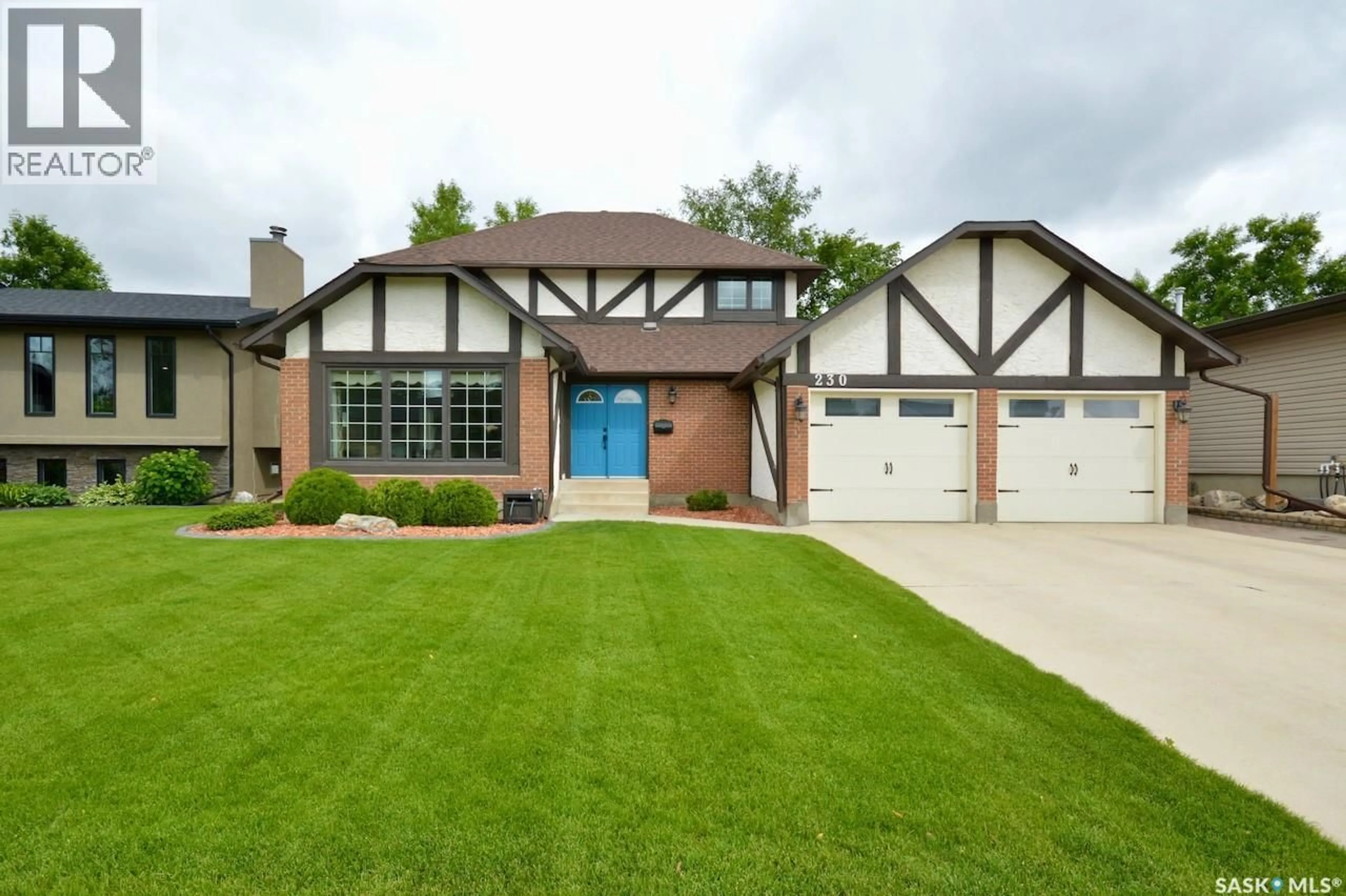 Home with brick exterior material, street for 230 DORE CRESCENT, Saskatoon Saskatchewan S7K4X9