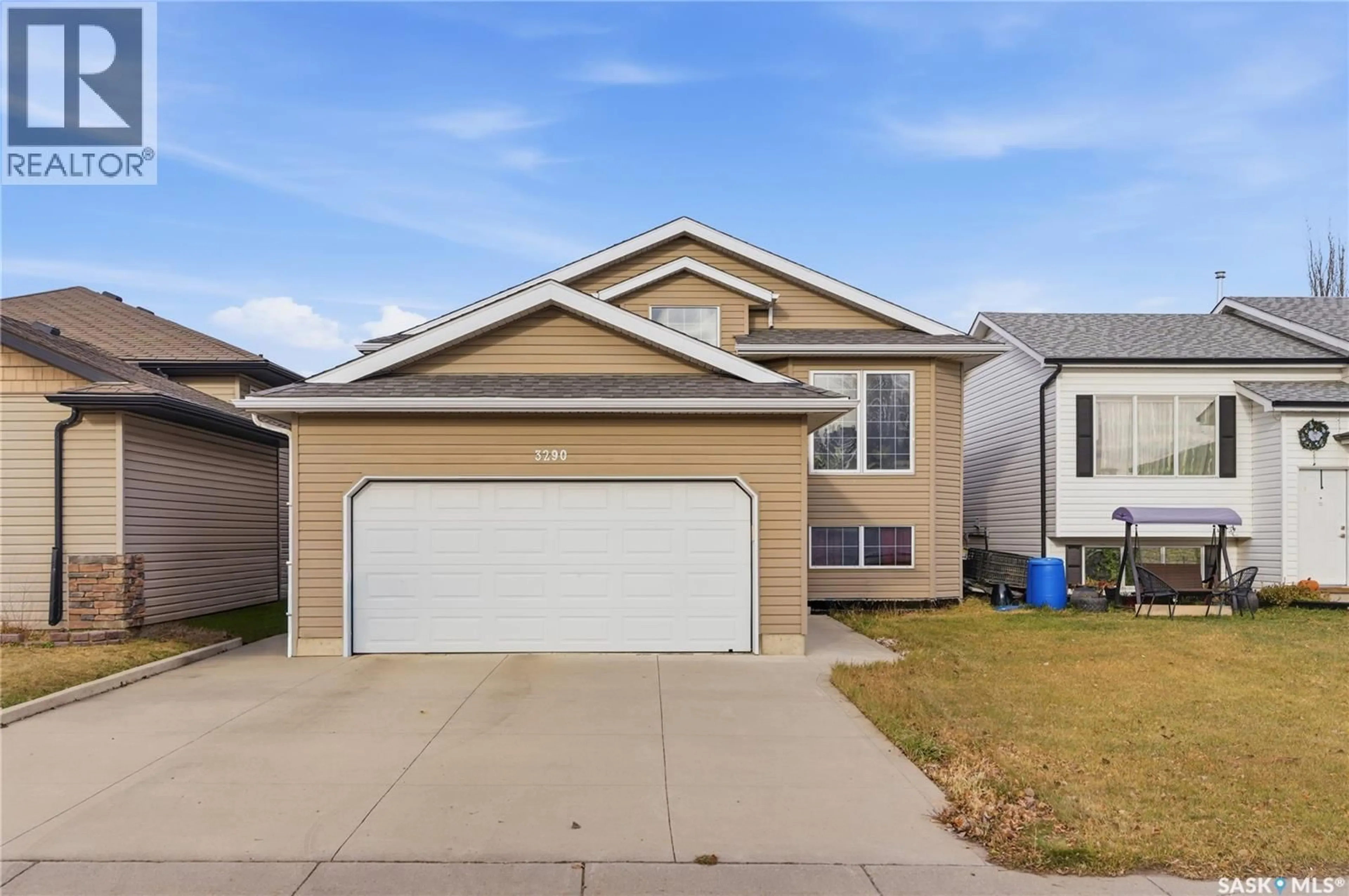 Home with vinyl exterior material, street for 3290 37TH STREET, Saskatoon Saskatchewan S7L7J3