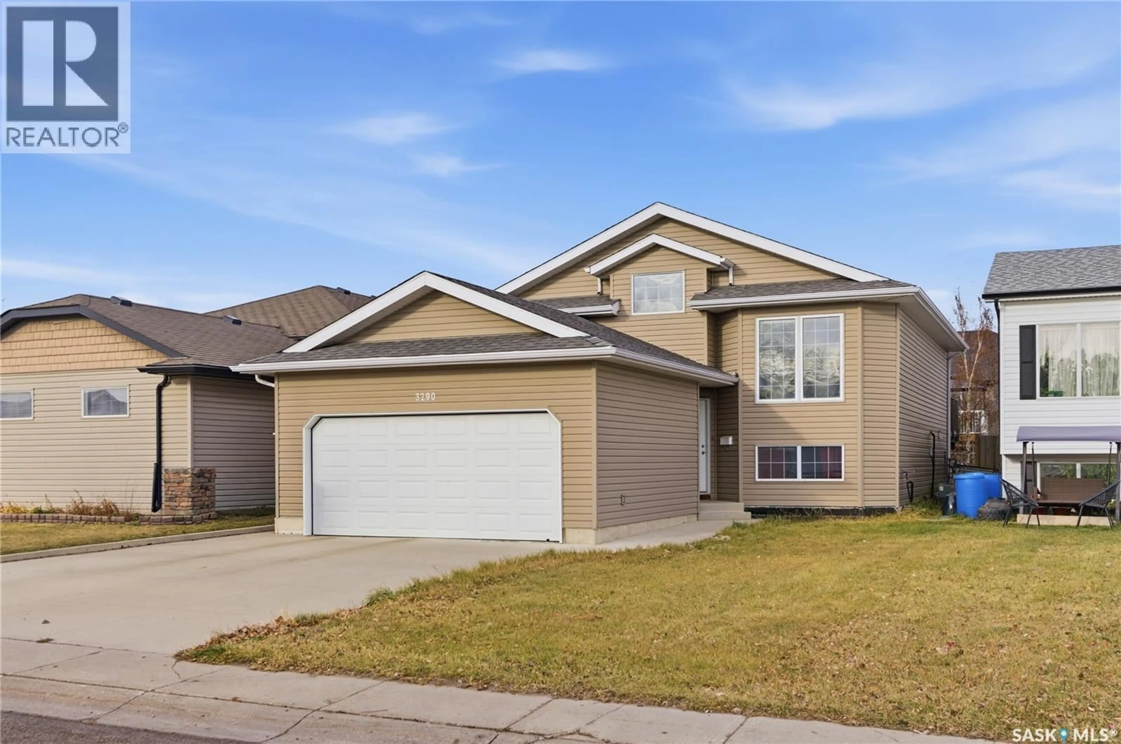 Home with vinyl exterior material, street for 3290 37TH STREET, Saskatoon Saskatchewan S7L7J3