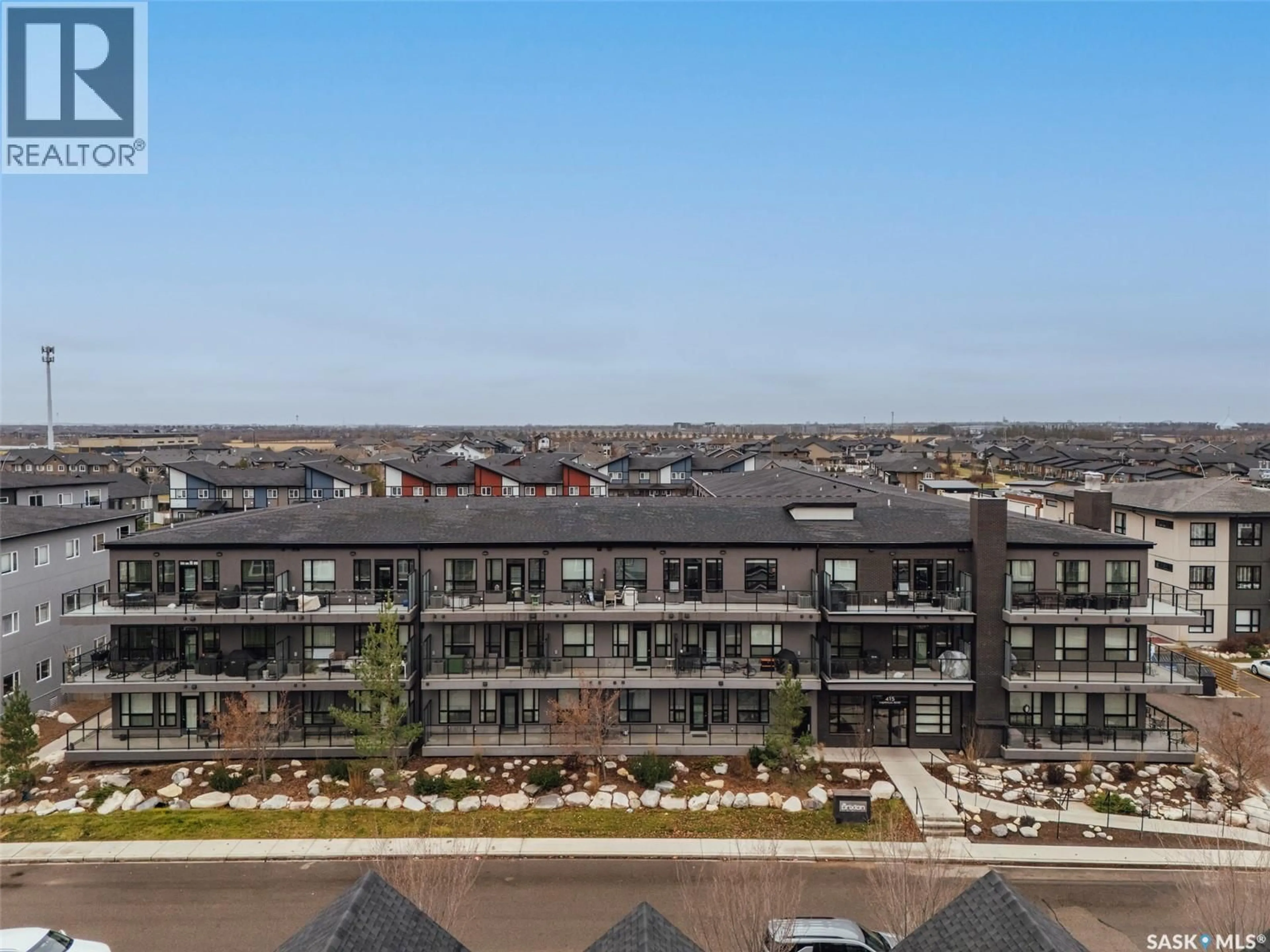 A pic from outside/outdoor area/front of a property/back of a property/a pic from drone, city buildings view from balcony for 415 - 307 MANINGAS BEND, Saskatoon Saskatchewan S7S1N1