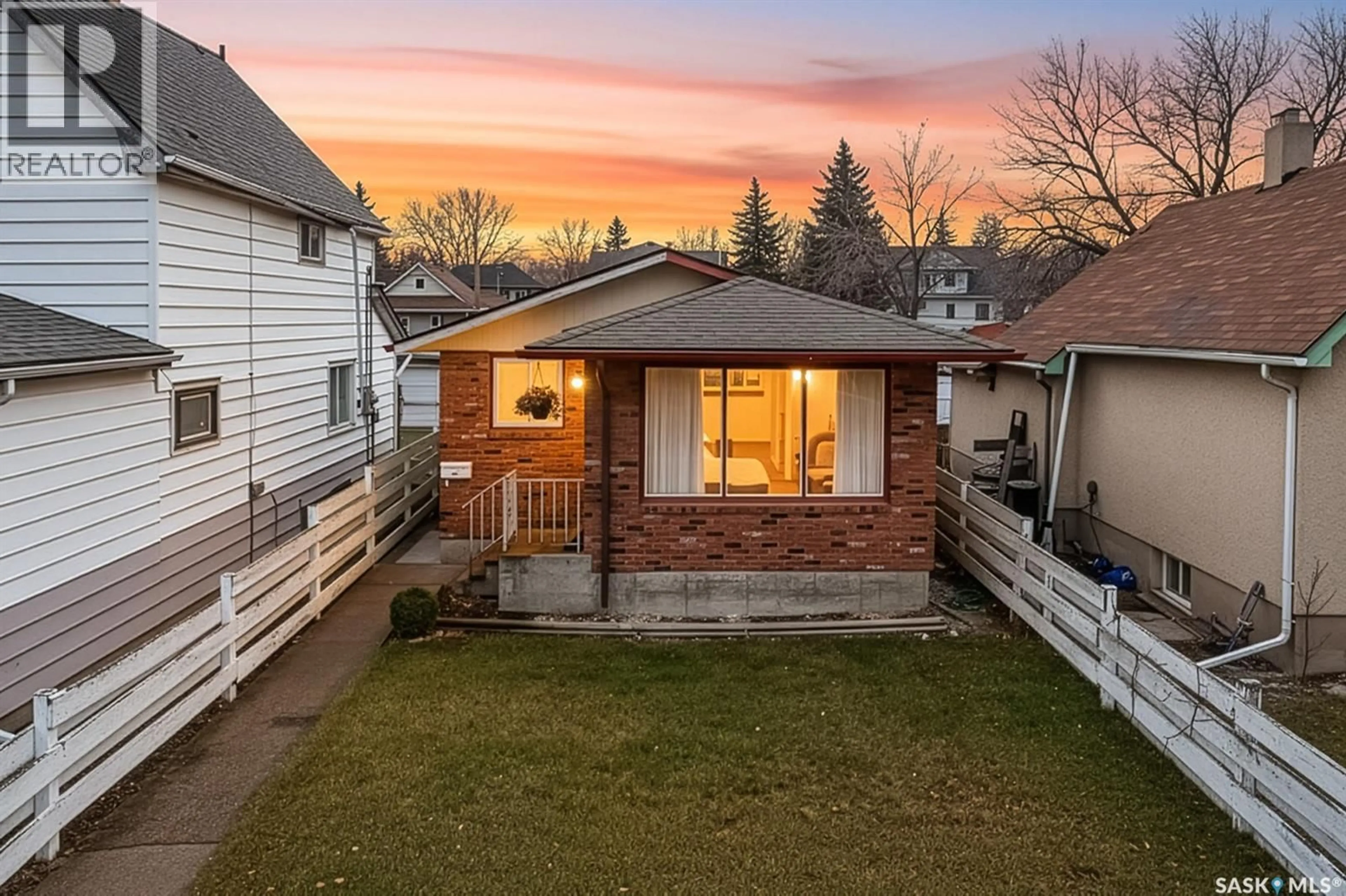 A pic from outside/outdoor area/front of a property/back of a property/a pic from drone, street for 651 STADACONA STREET, Moose Jaw Saskatchewan S6H0K1