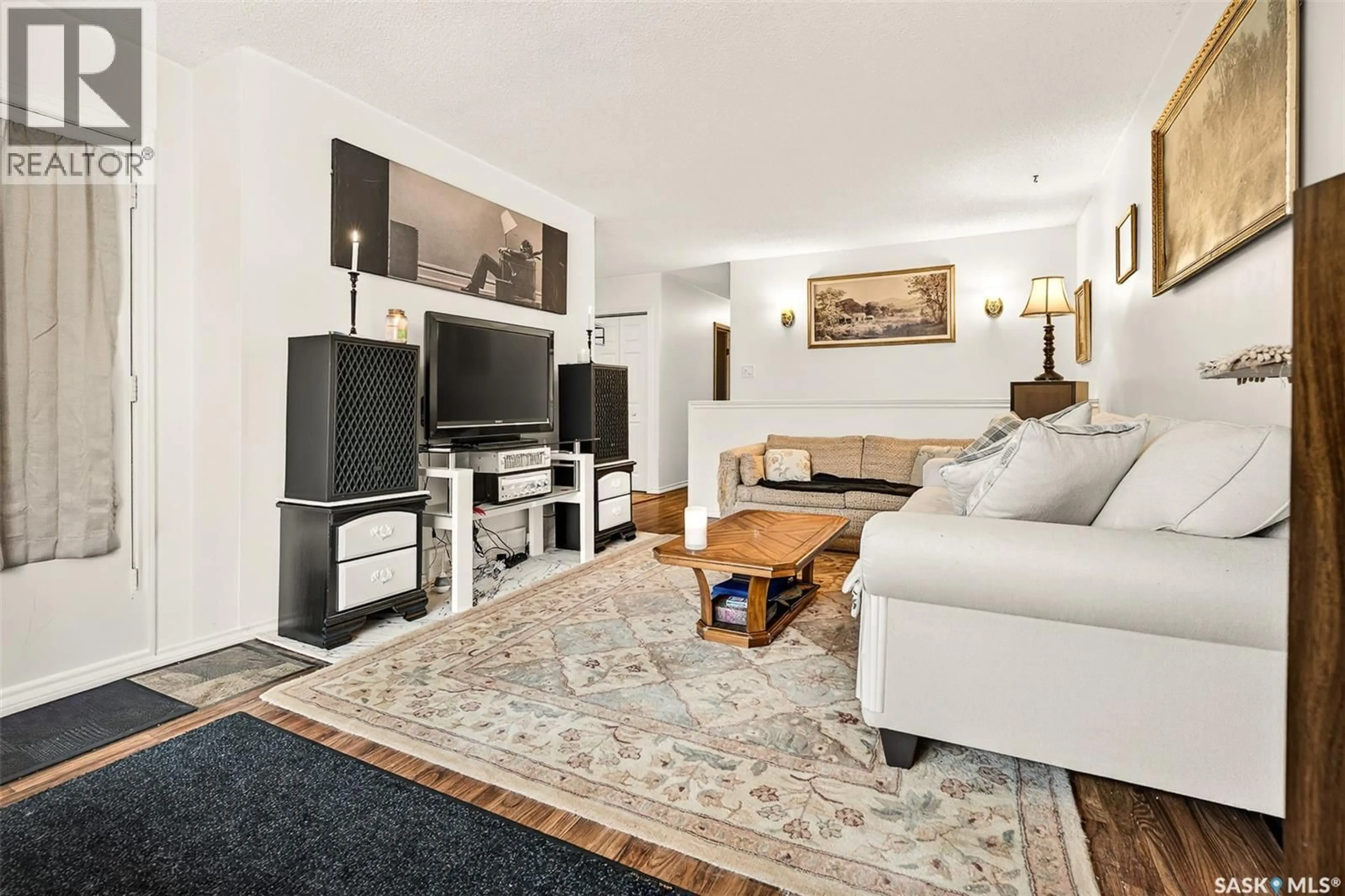 Living room with furniture, unknown for 651 STADACONA STREET, Moose Jaw Saskatchewan S6H0K1