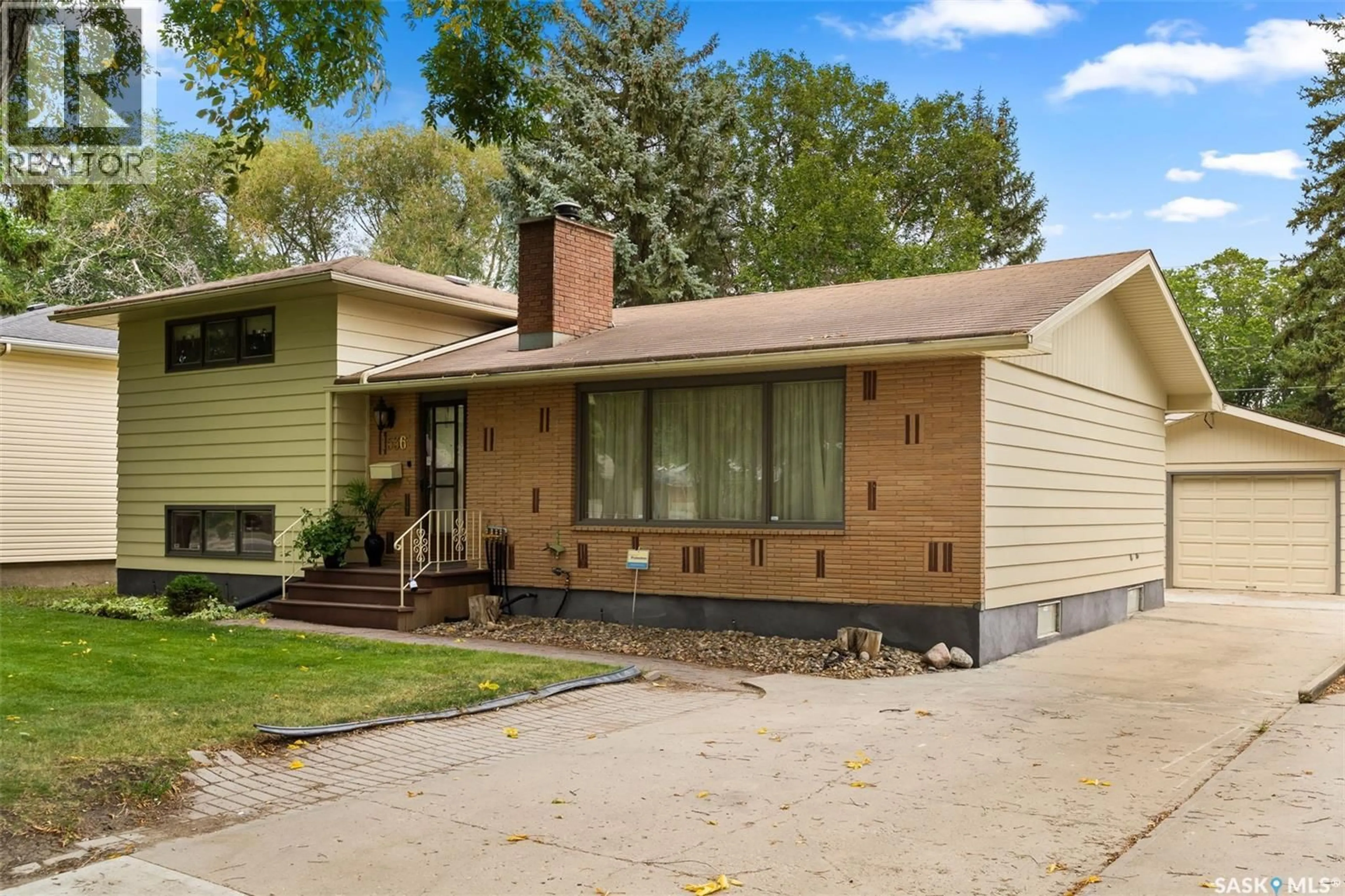 Home with vinyl exterior material, street for 1536 UHRICH AVENUE, Regina Saskatchewan S4S4R5