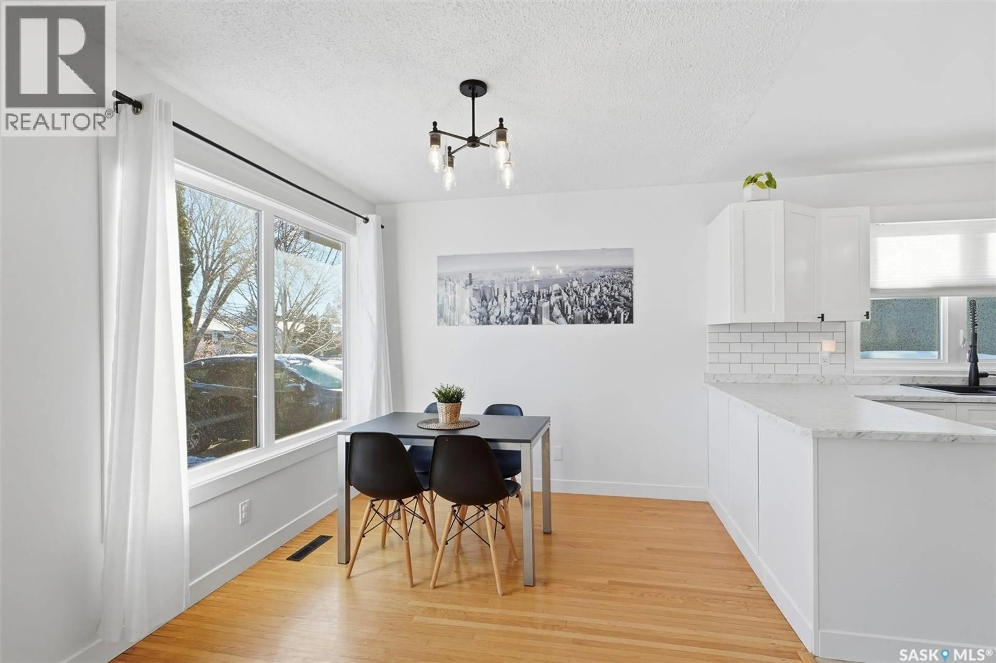 Dining room, wood/laminate floor for 45 PORTEOUS CRESCENT, Saskatoon Saskatchewan S7J2S7