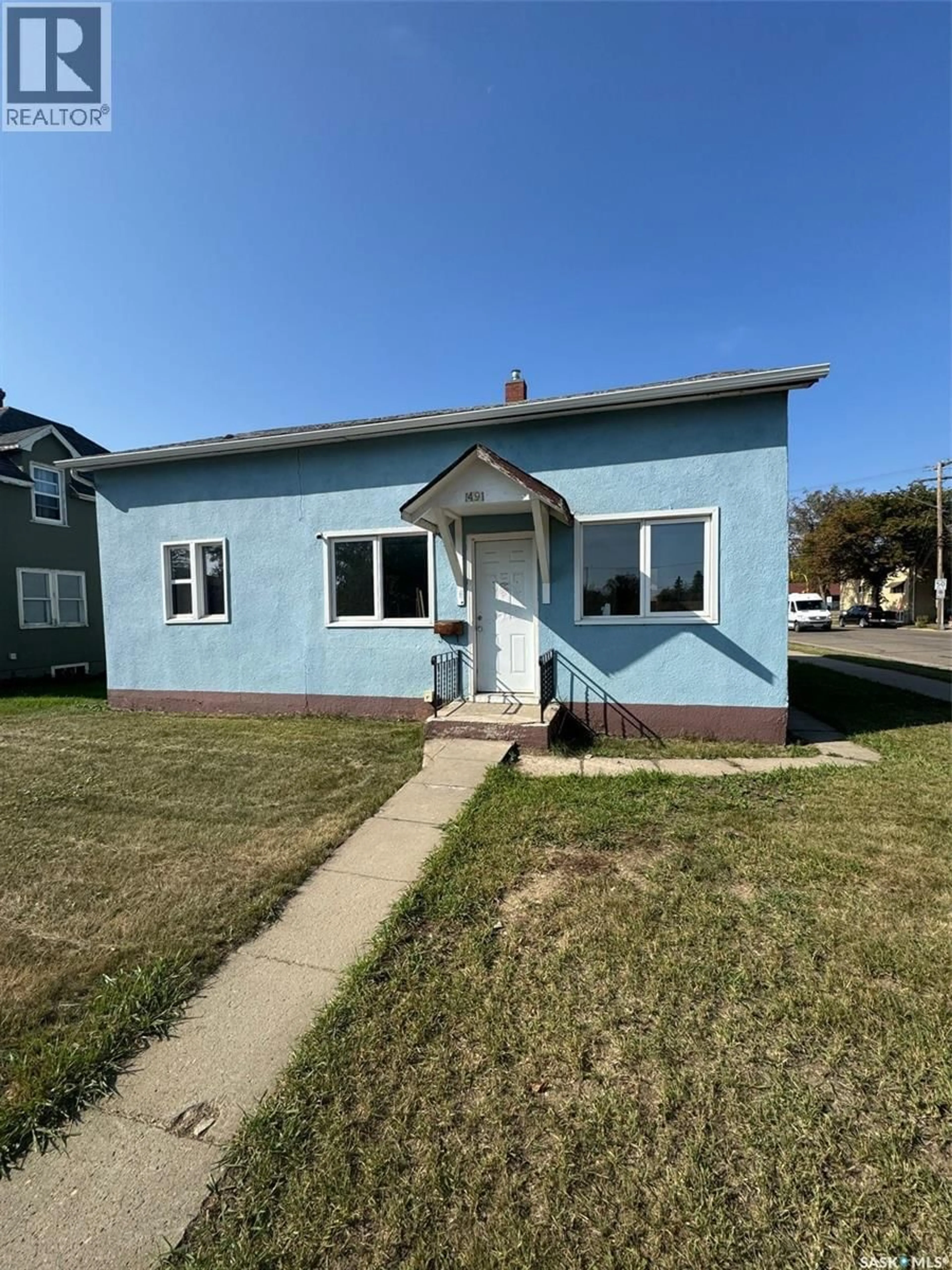 Home with vinyl exterior material, street for 1491 101ST STREET, North Battleford Saskatchewan S9A0W6