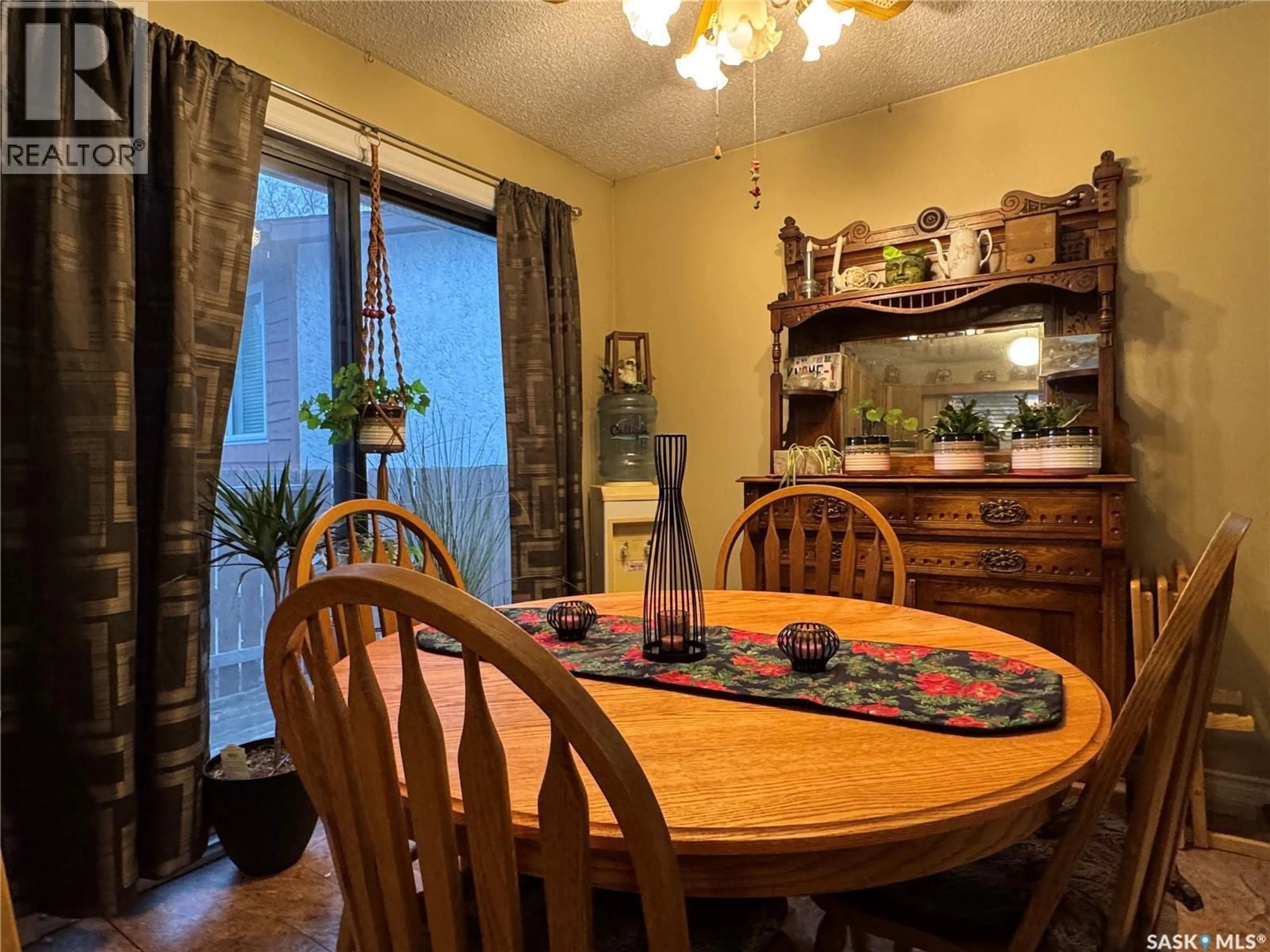 Dining room, wood/laminate floor for 97 DOROTHY STREET, Regina Saskatchewan S4T7B2