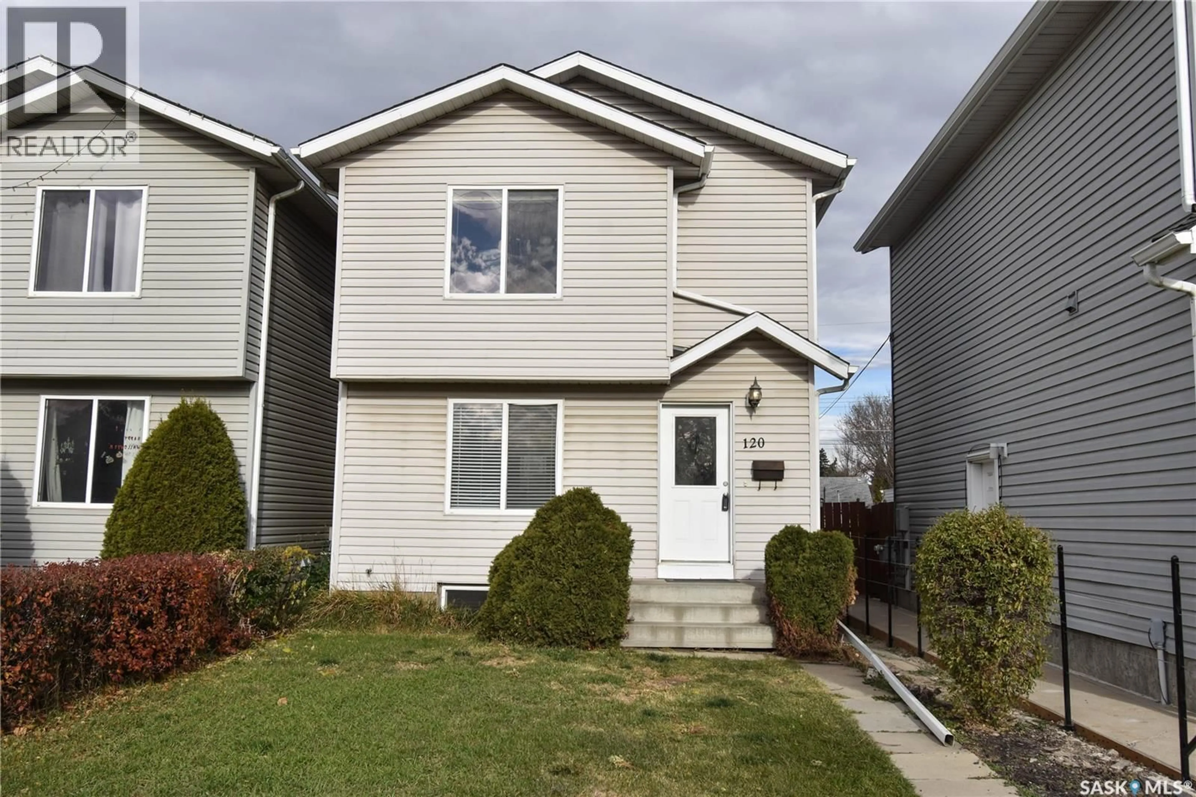 Home with vinyl exterior material, street for 120 115TH STREET, Saskatoon Saskatchewan S7N1W3
