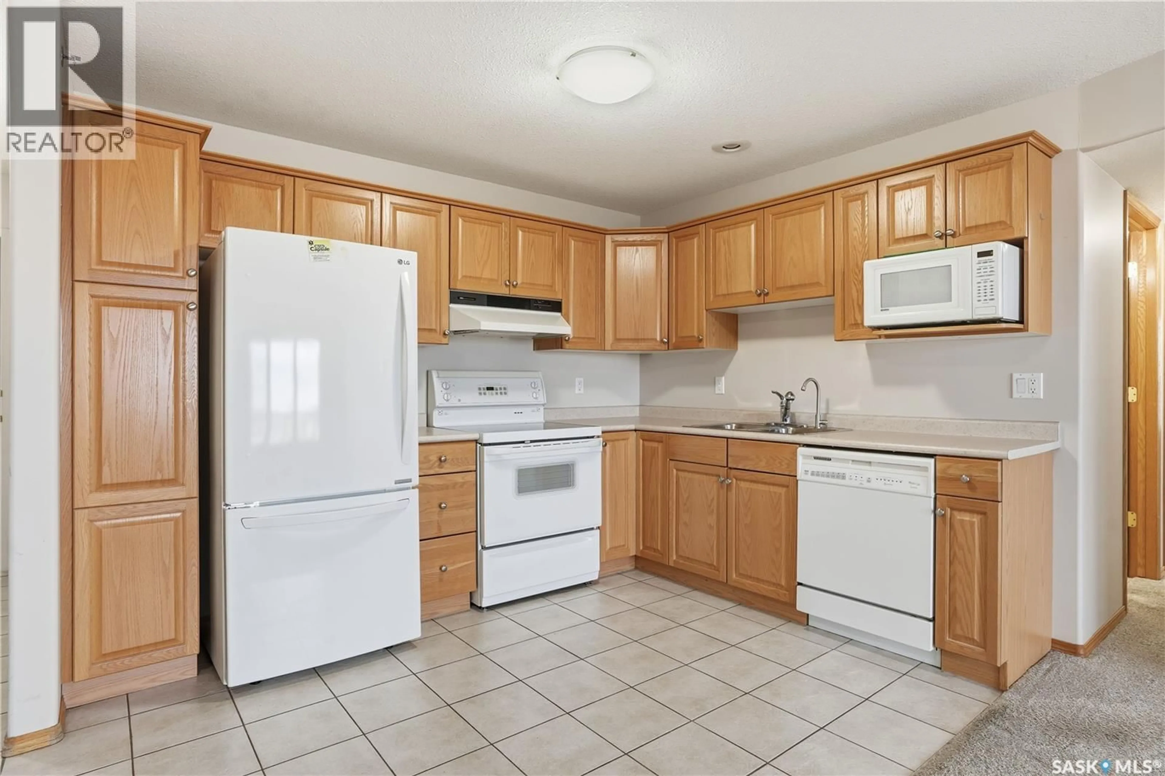Standard kitchen, ceramic/tile floor for 405 - 205 MCINTYRE STREET, Regina Saskatchewan S4R3B7