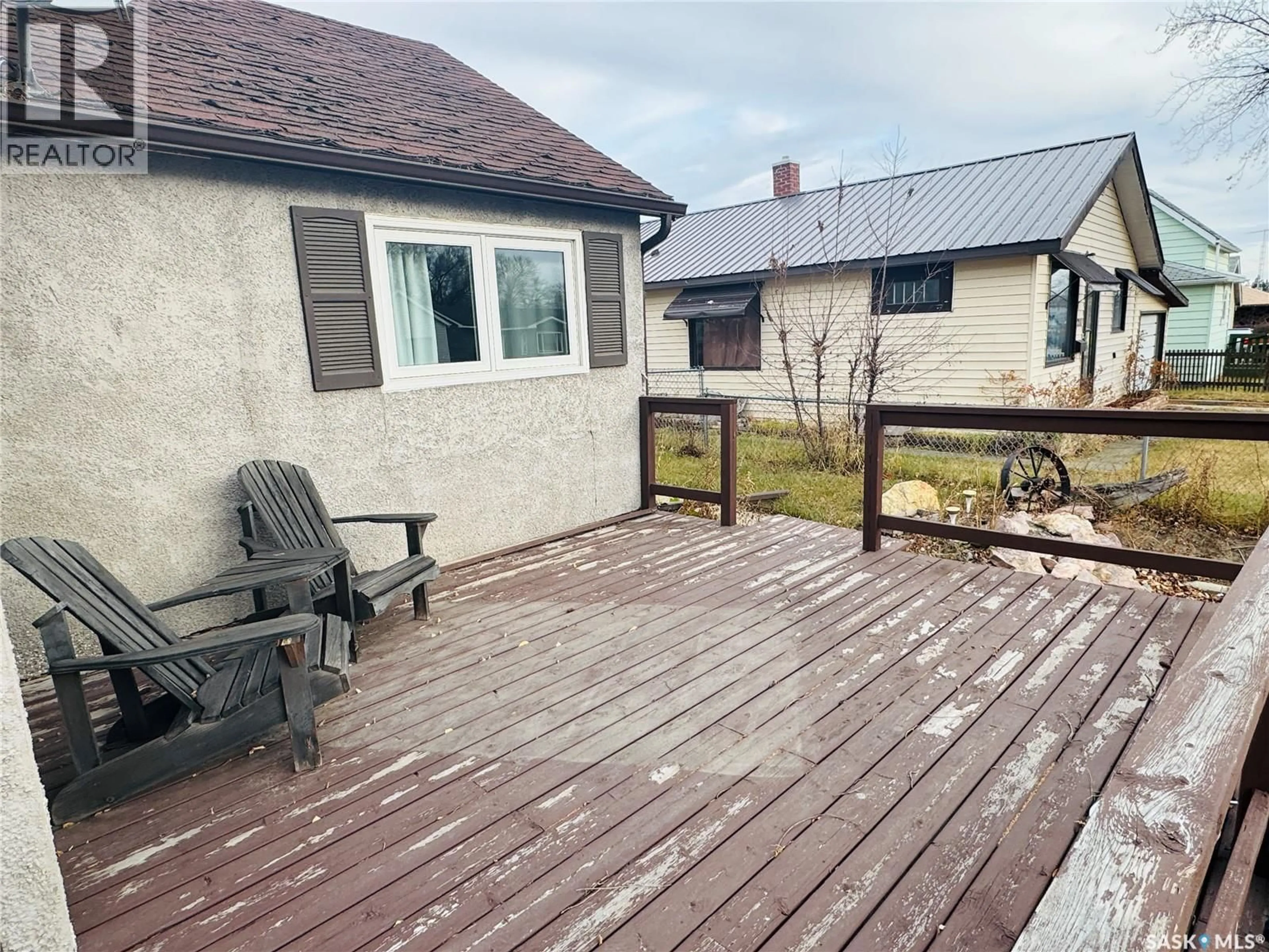 A pic from outside/outdoor area/front of a property/back of a property/a pic from drone, street for 213 3RD AVENUE, Biggar Saskatchewan S0K0M0