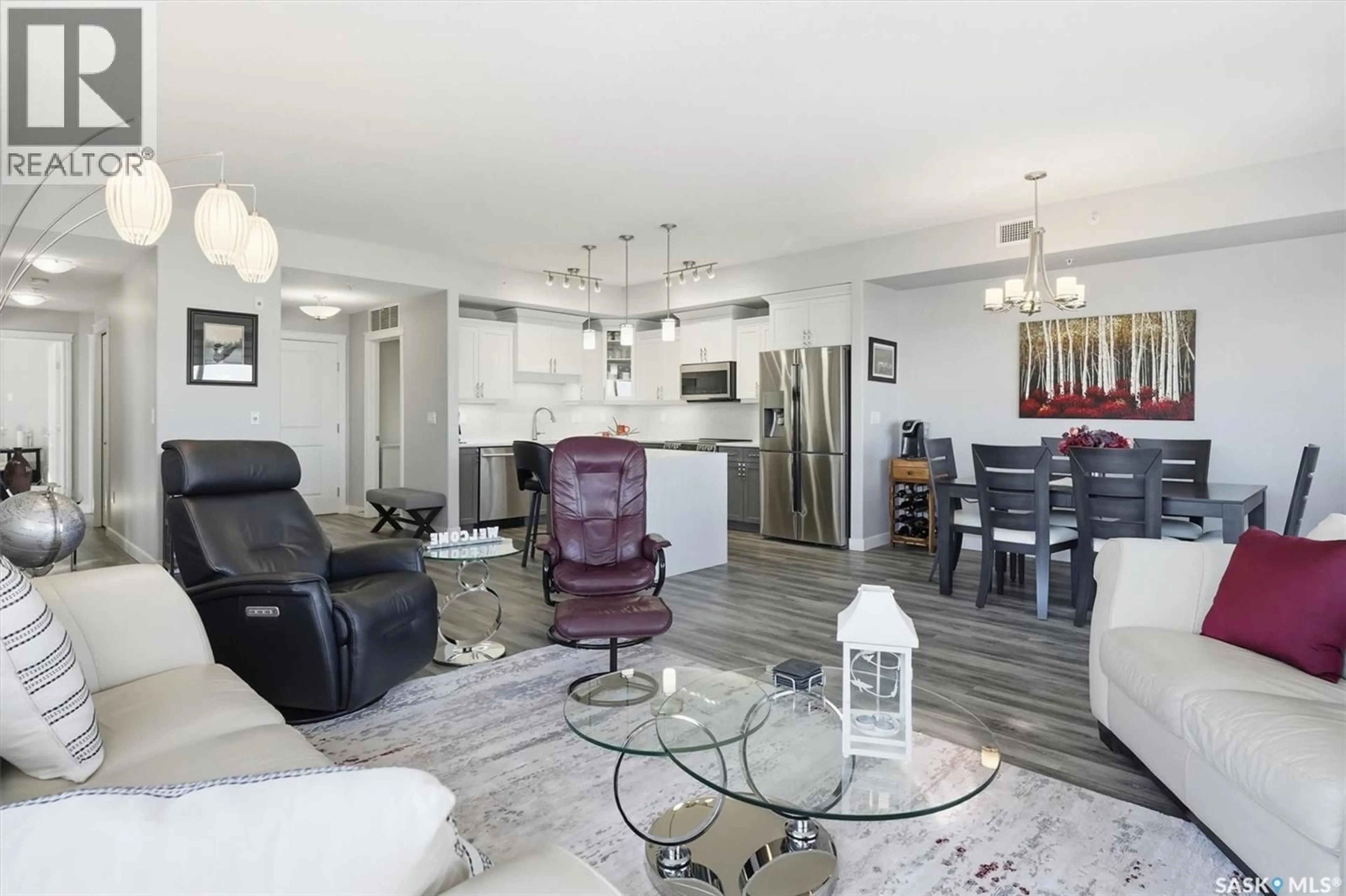 Living room with furniture, unknown for 407 405 CARTWRIGHT STREET, Saskatoon Saskatchewan S7T0C8