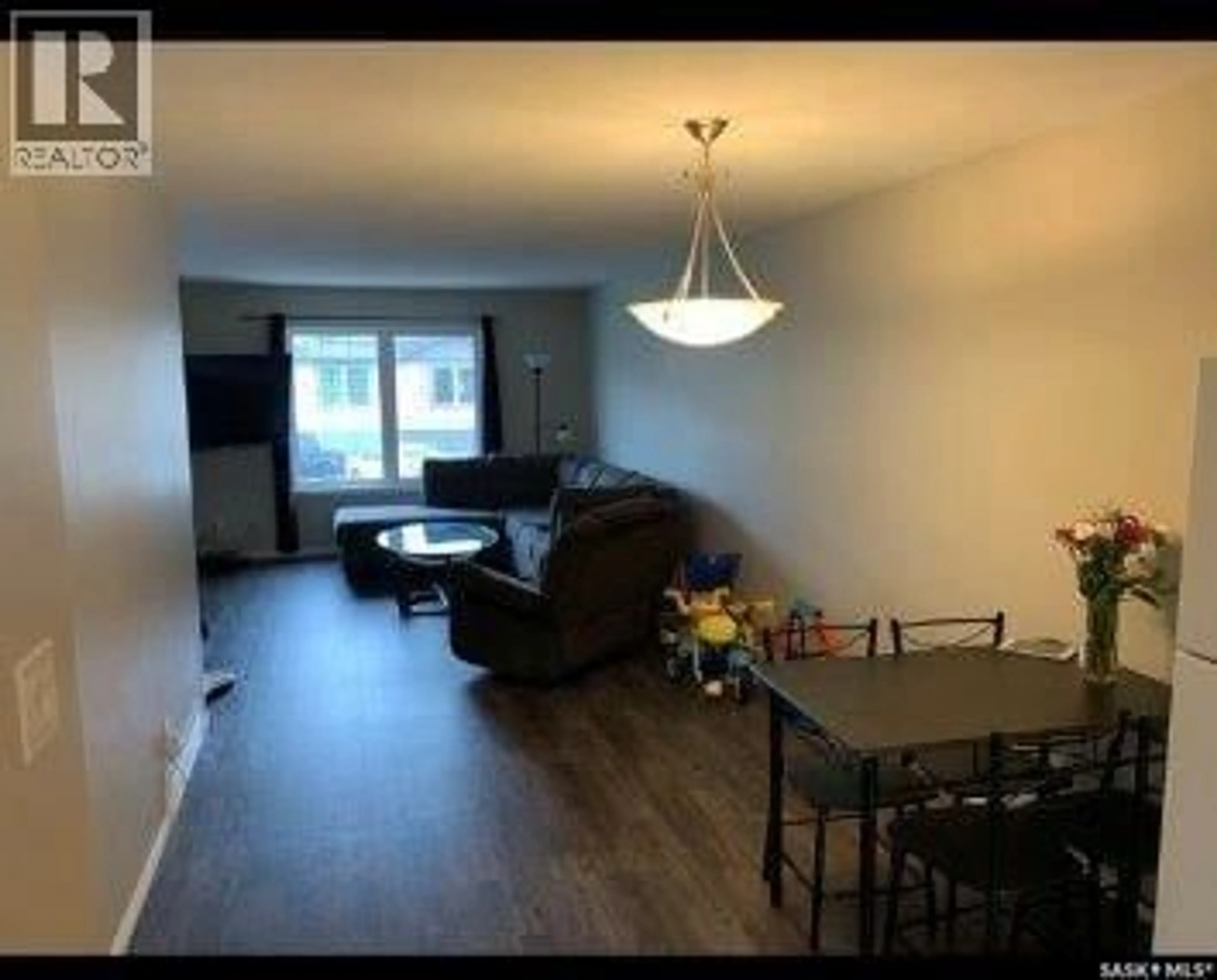 Living room with furniture, wood/laminate floor for 72 - 29 CAMERON WAY, Yorkton Saskatchewan S3N2X3