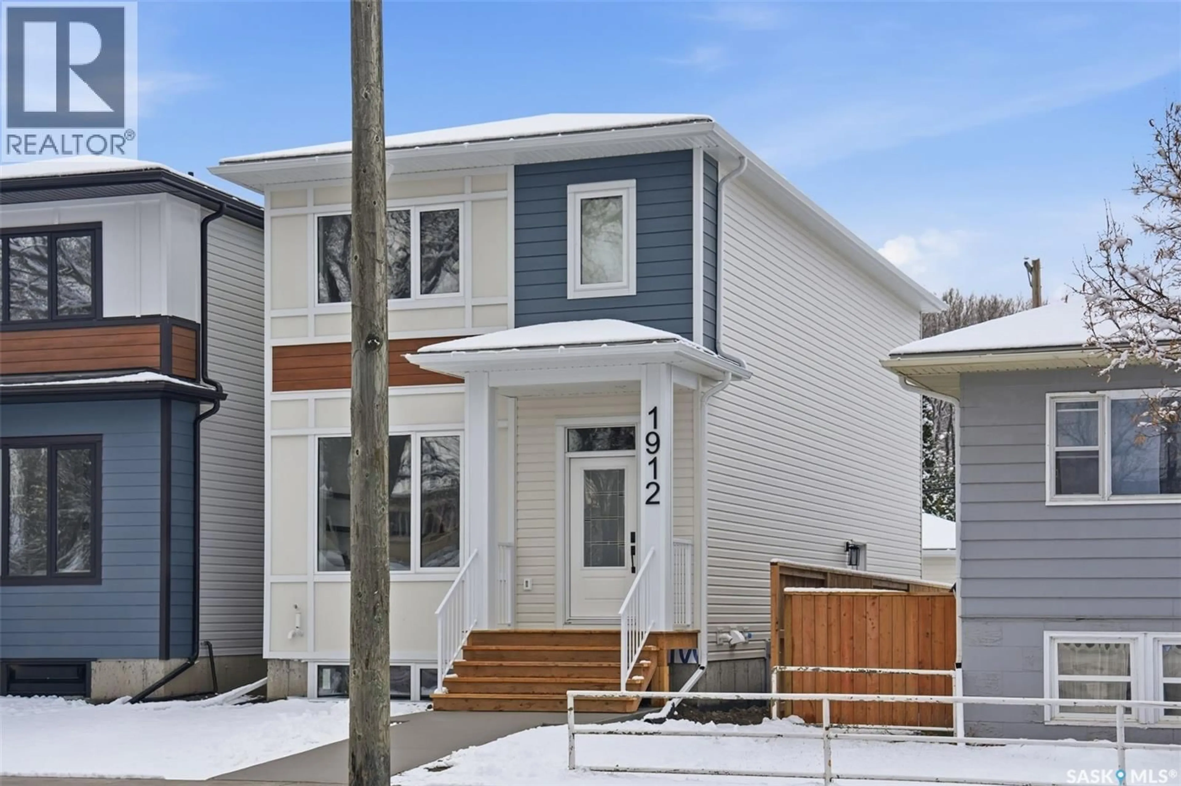 Home with vinyl exterior material, street for 1912 HERMAN AVENUE, Saskatoon Saskatchewan S7M0M8