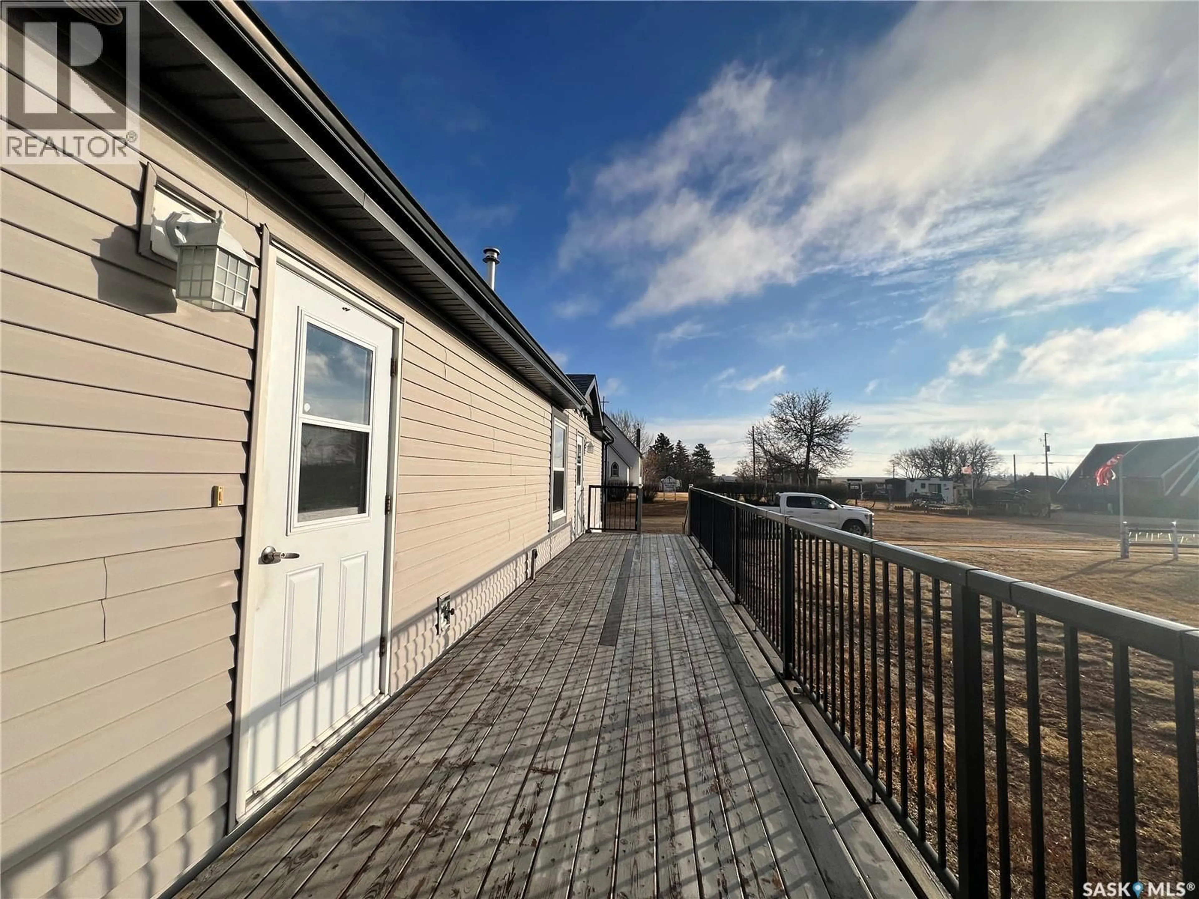 A pic from outside/outdoor area/front of a property/back of a property/a pic from drone, street for 42 2ND STREET, Tompkins Saskatchewan S0N2S0