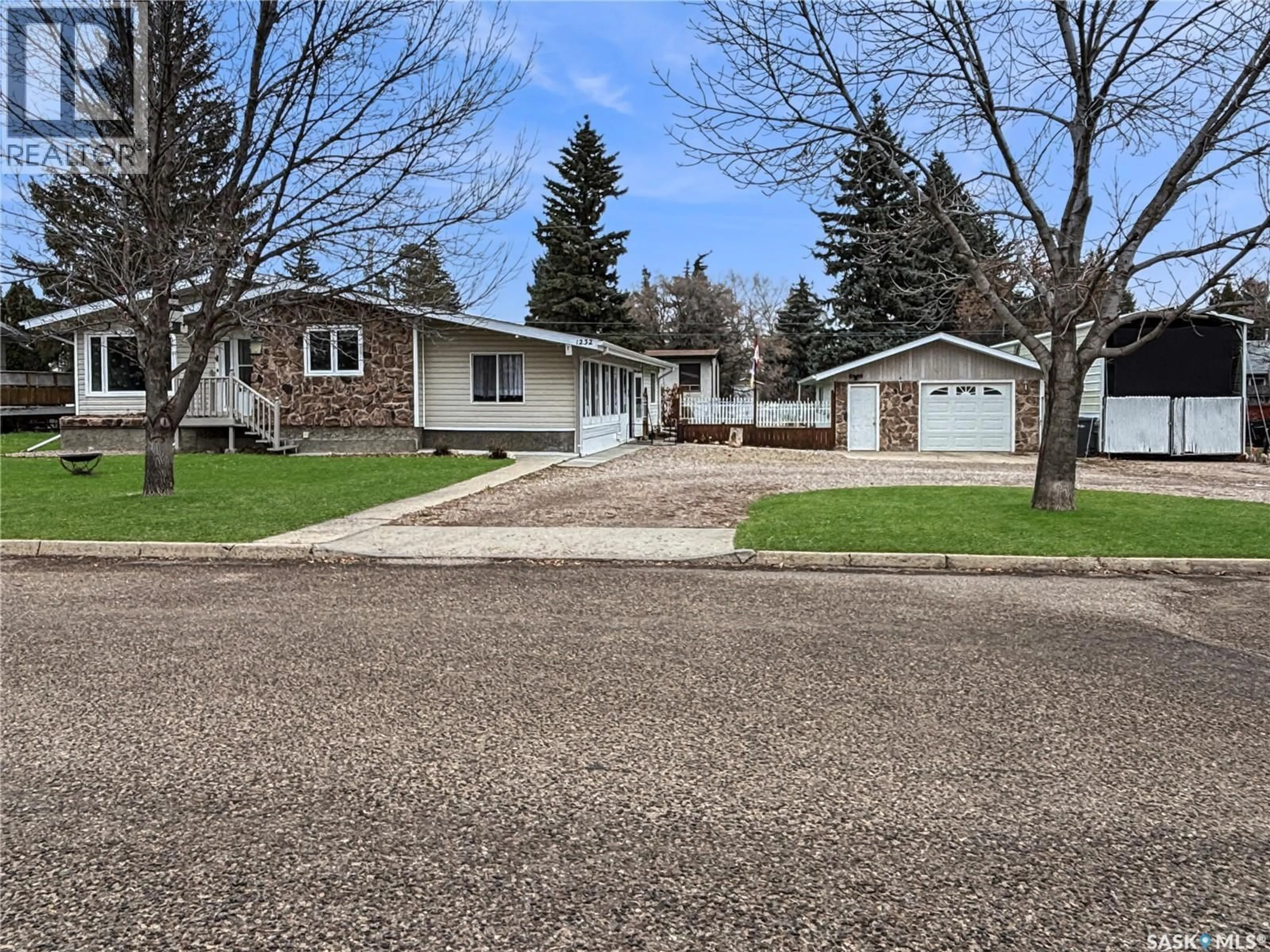 A pic from outside/outdoor area/front of a property/back of a property/a pic from drone, street for 1232 111TH STREET, North Battleford Saskatchewan S9A3N3
